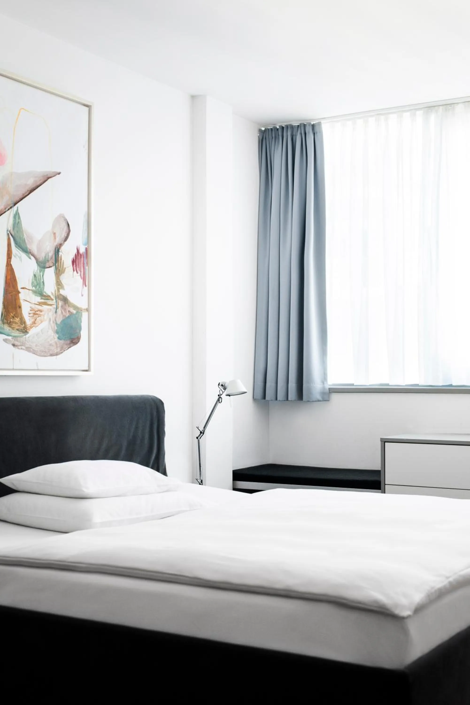 Bed in Augarten Art Hotel, a Member of Design Hotels