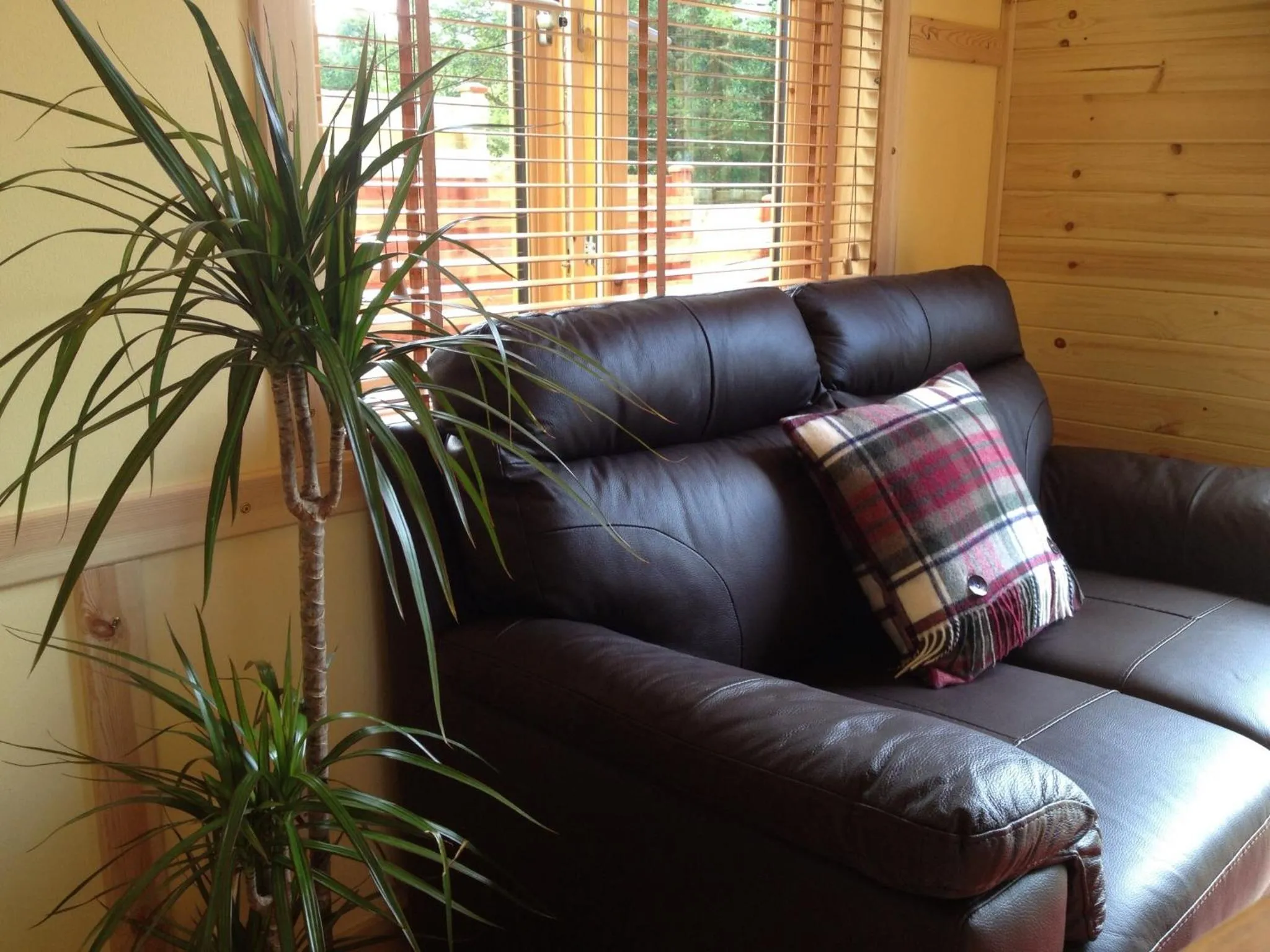 Seating area in Rashfield Sheilings - Riverside Lodges, by Pucks Glen, Dunoon