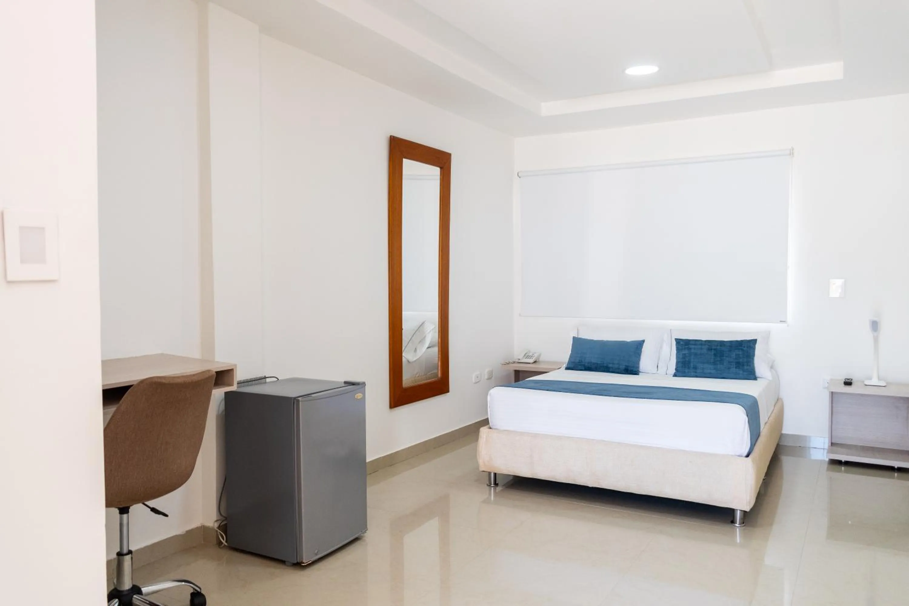 Seating area, Bed in Hotel Corozal Plaza