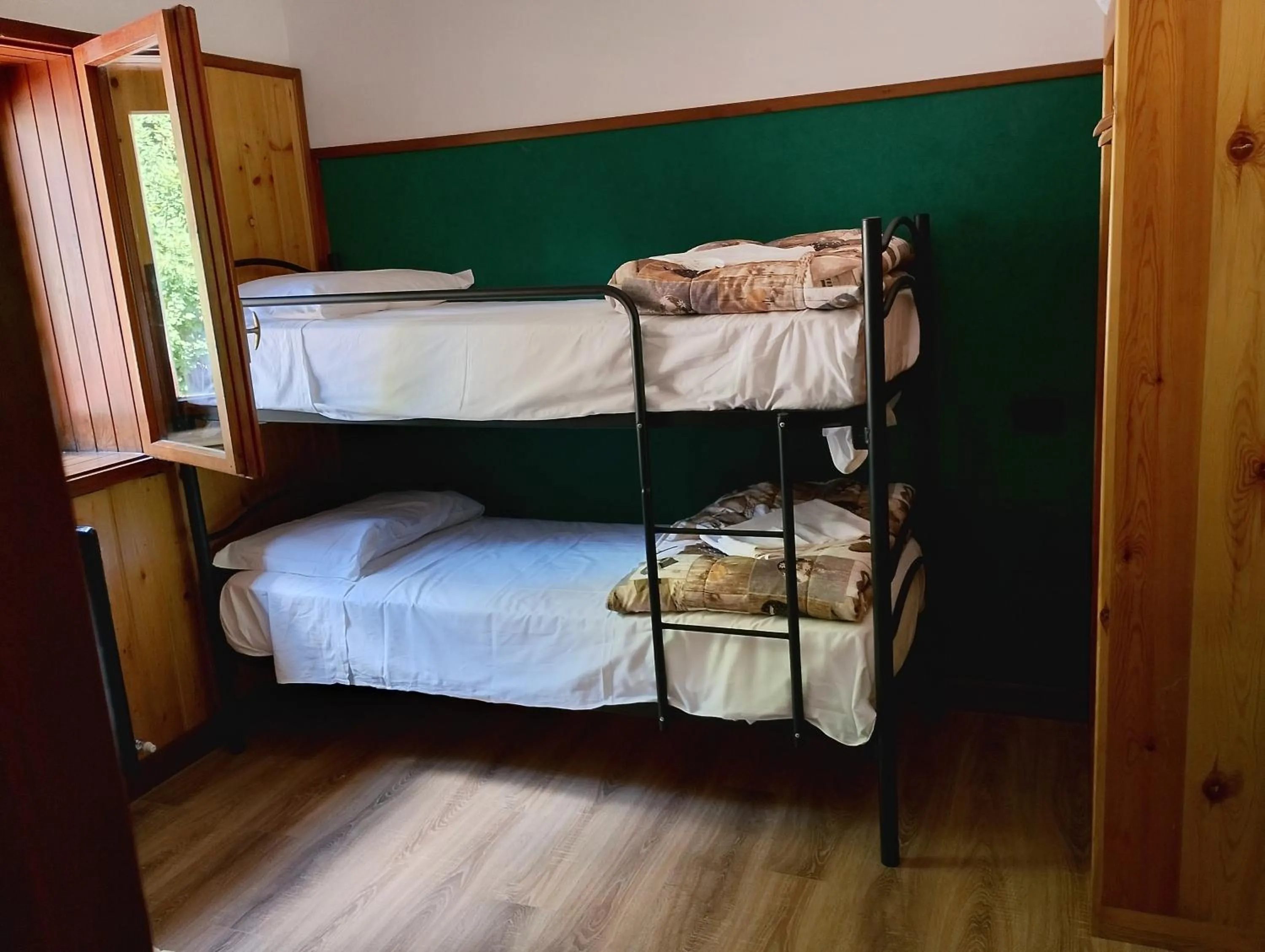 Bed in Hotel La Piccola Baita