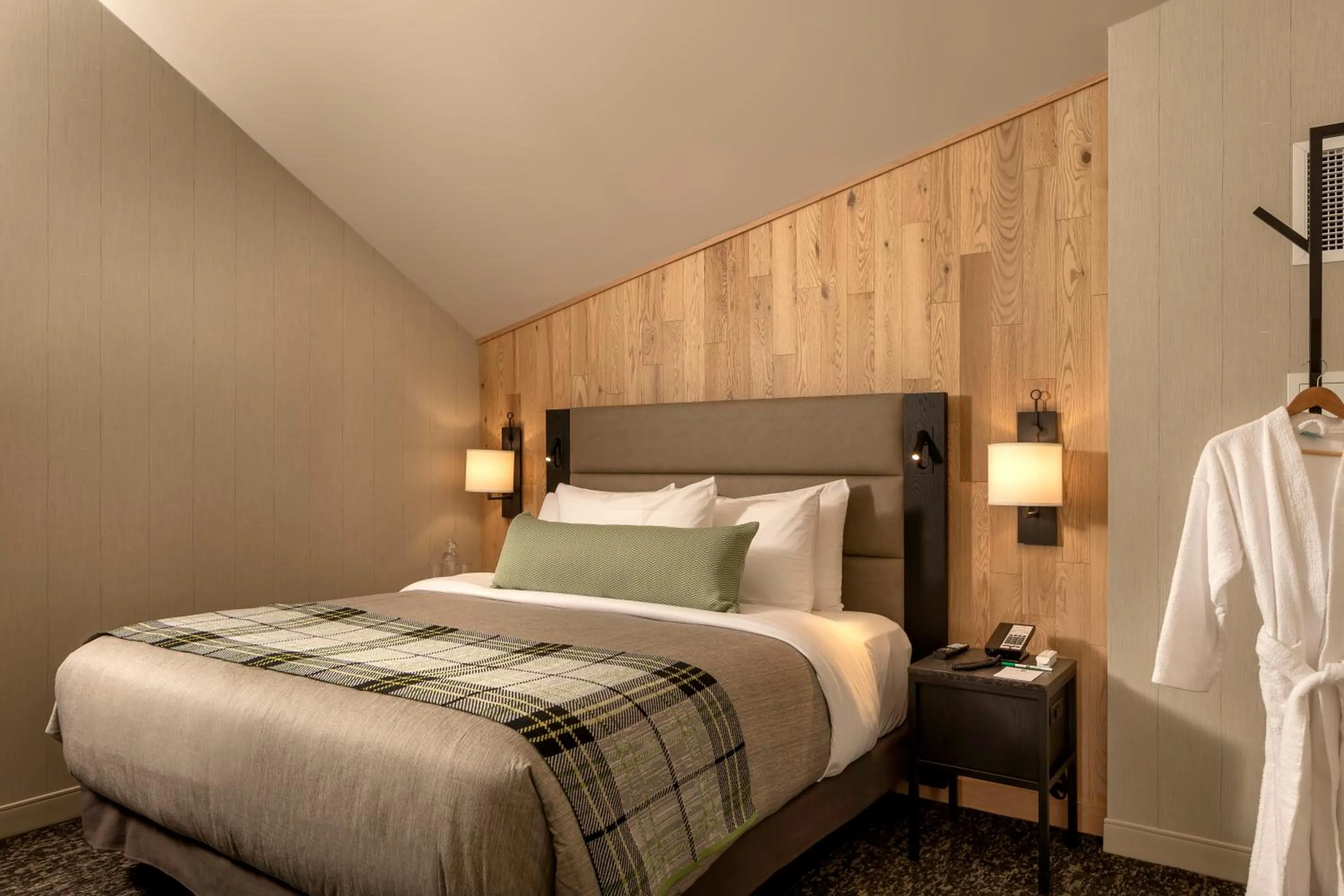 Bed in Peaks Hotel and Suites