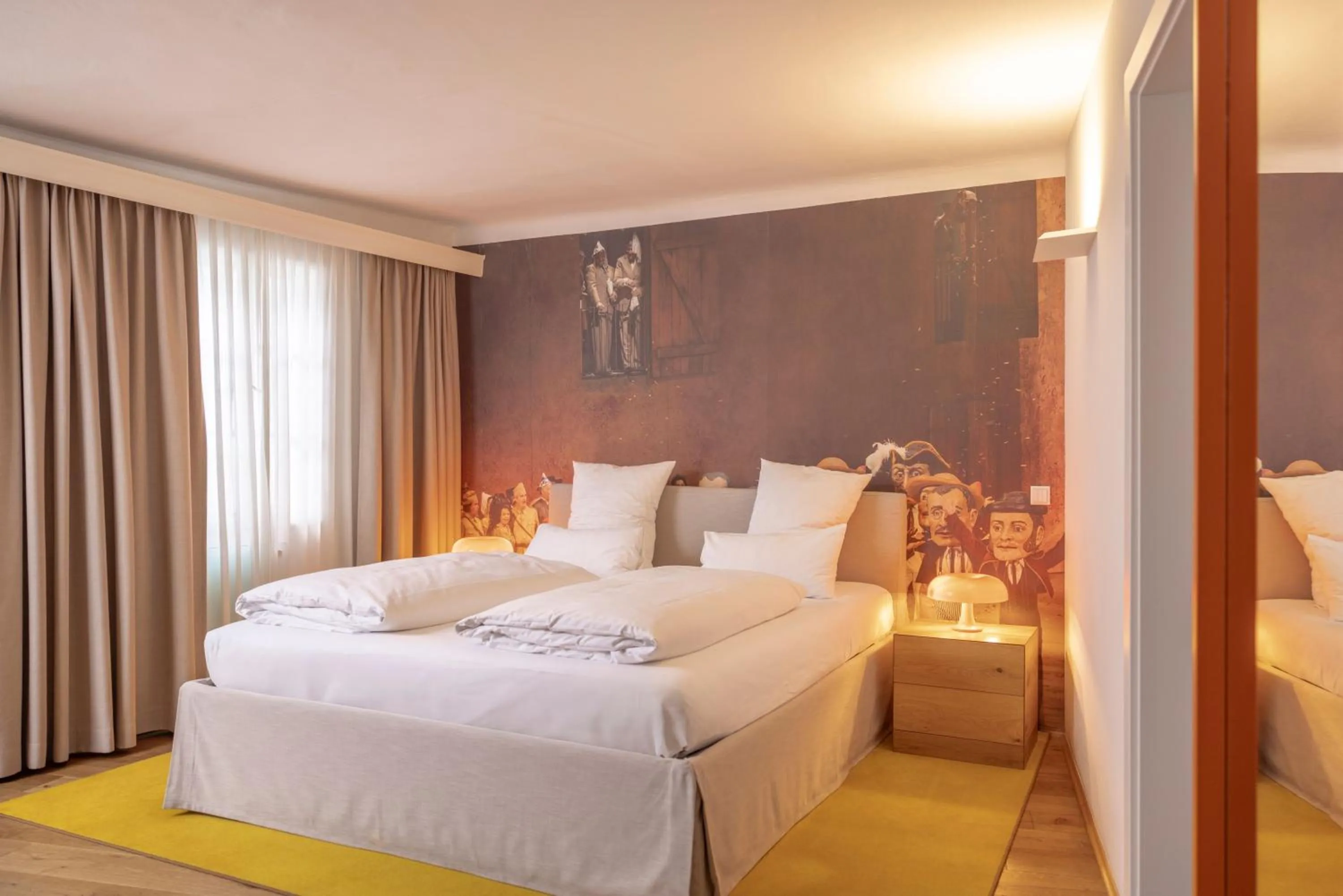 Bed in Small Luxury Hotel Goldgasse