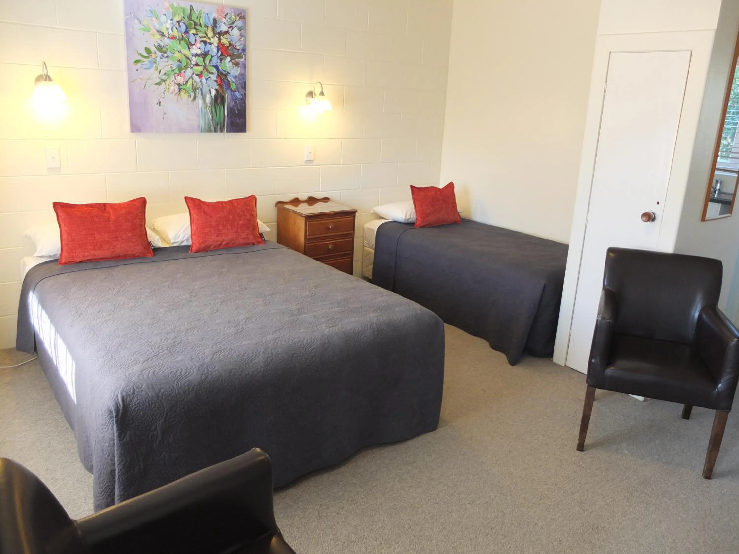 Bed in Colonial Court Motel