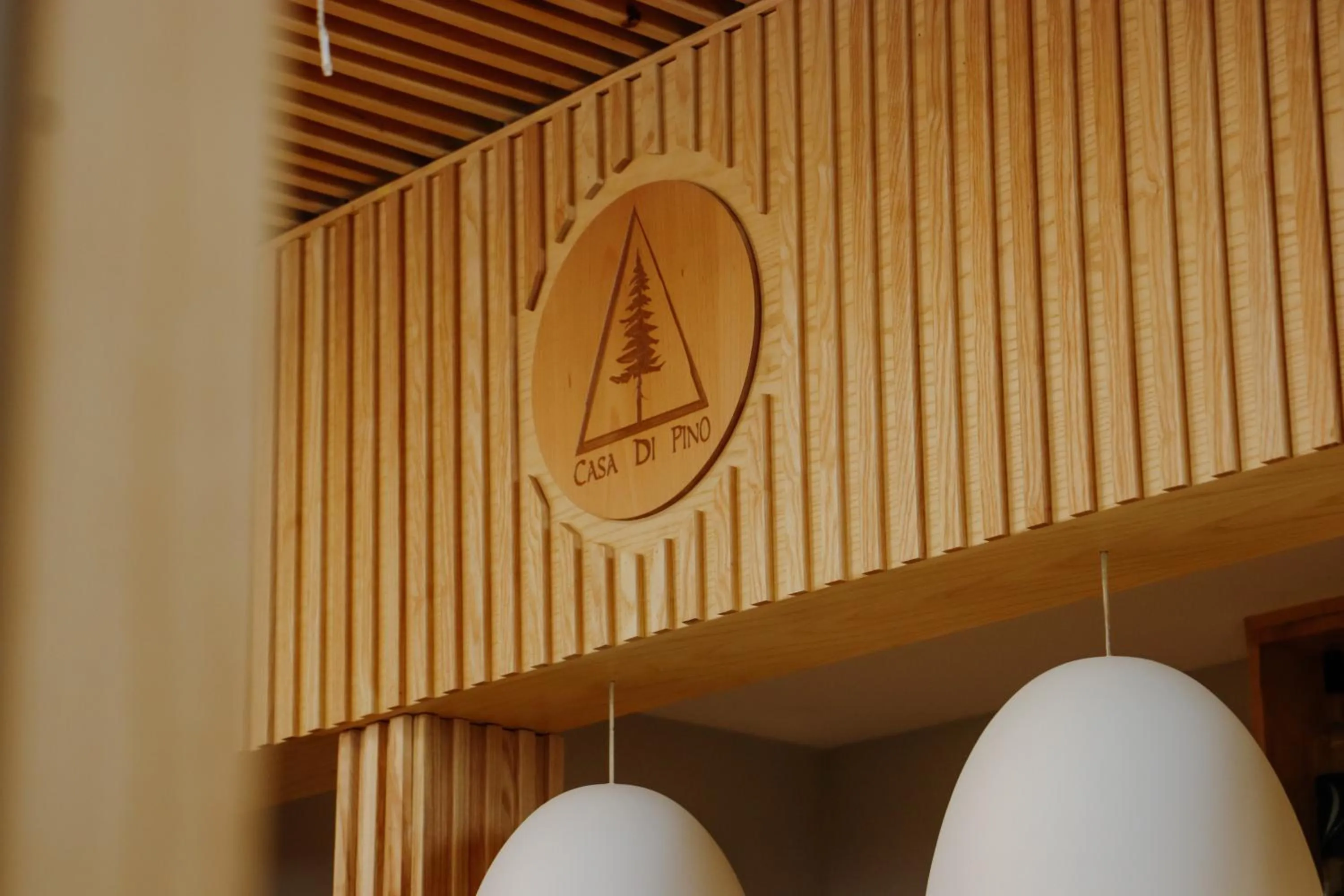 Logo/Certificate/Sign in Casa di Pino EcoLodge Hotel