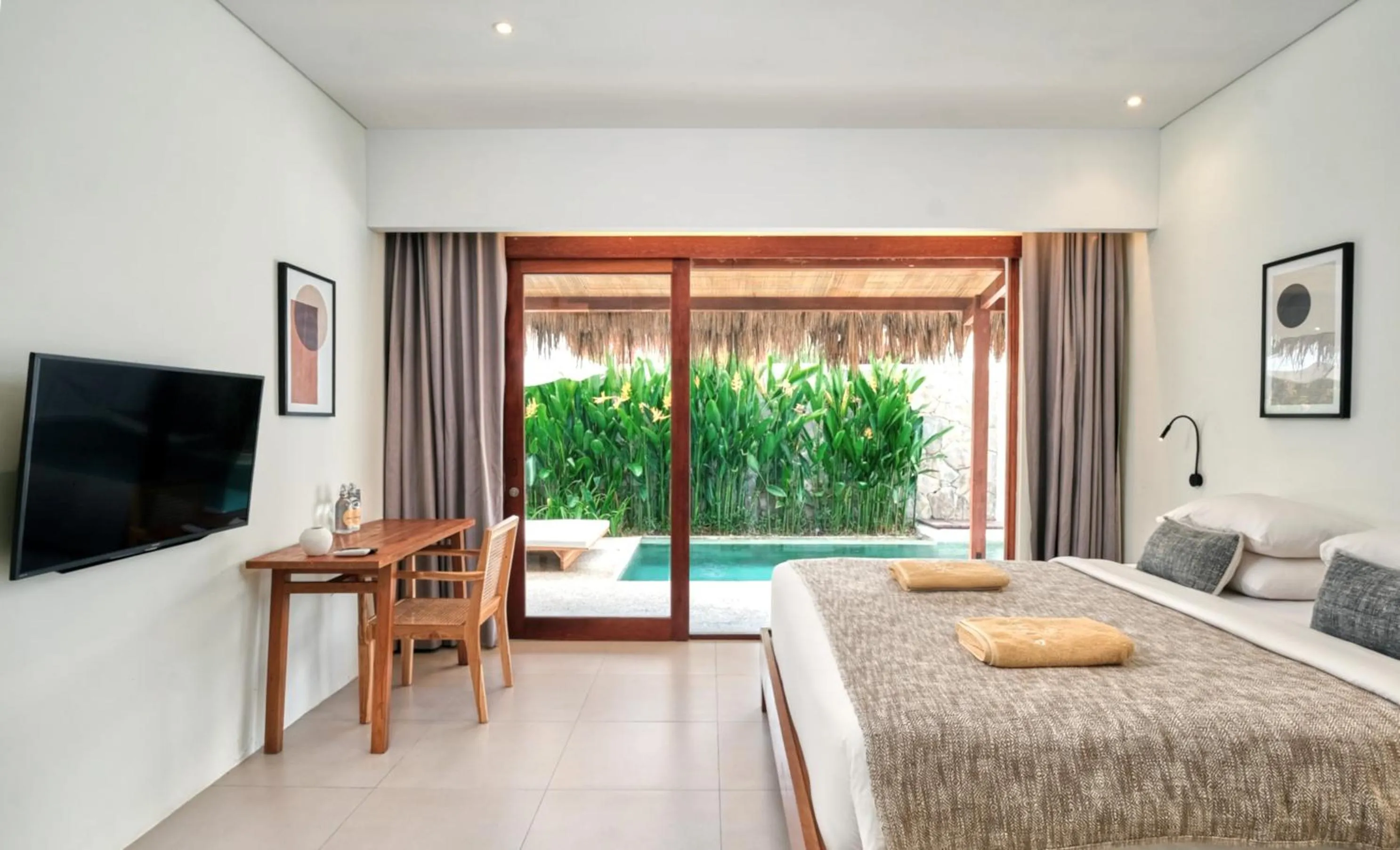 Bed in Amber Lombok Beach Resort