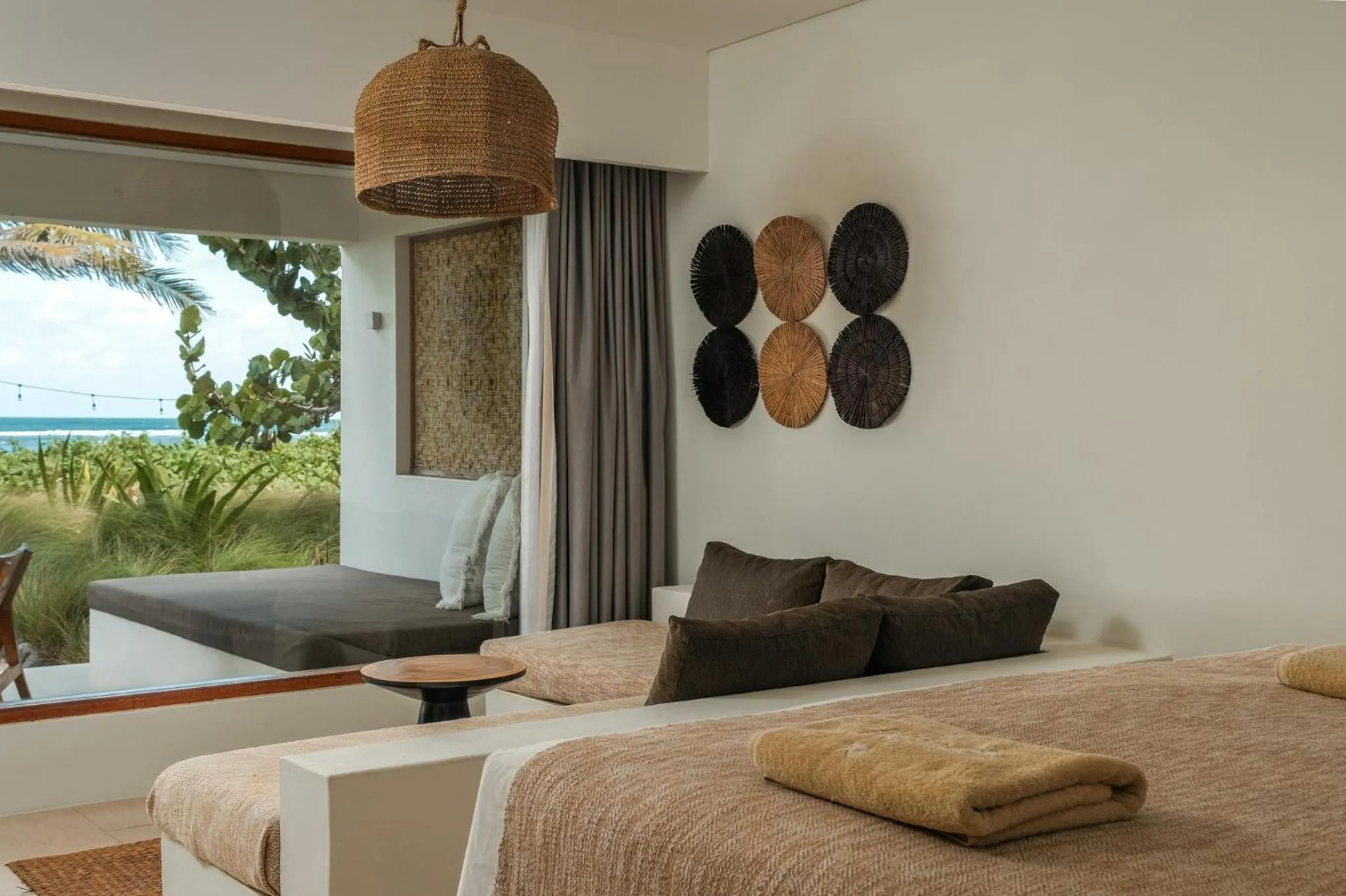 Bed in Amber Lombok Beach Resort