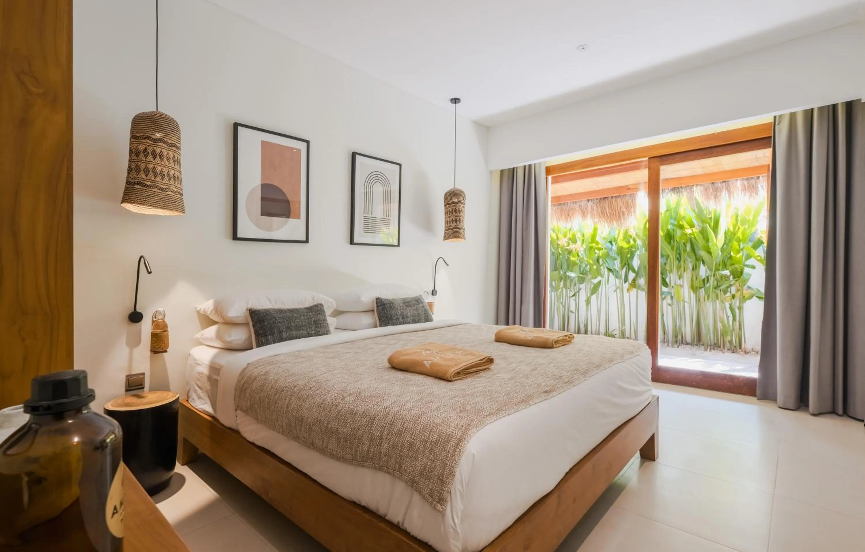 Bed in Amber Lombok Beach Resort