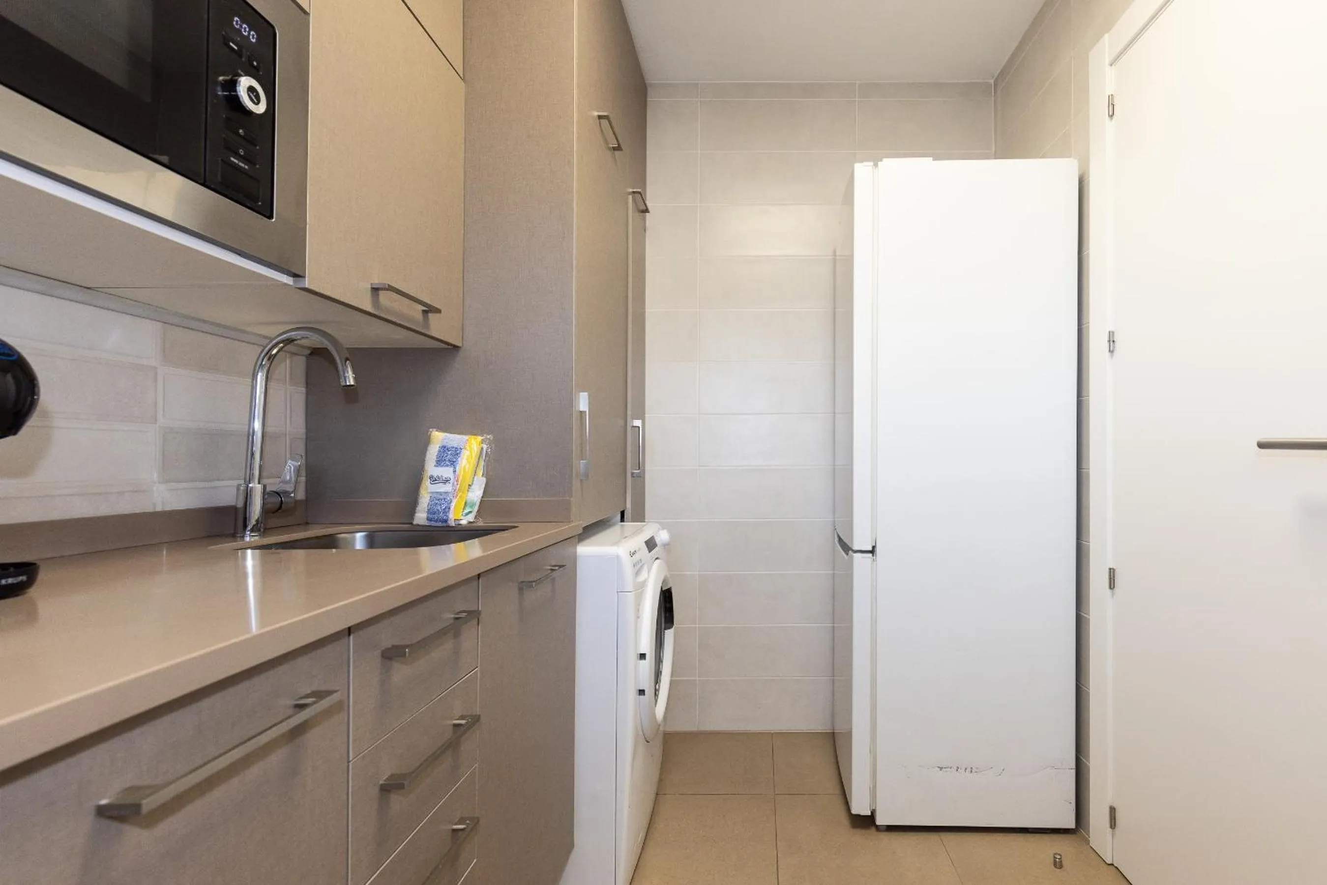 Kitchen or kitchenette in Rentalmar Murillo Plus