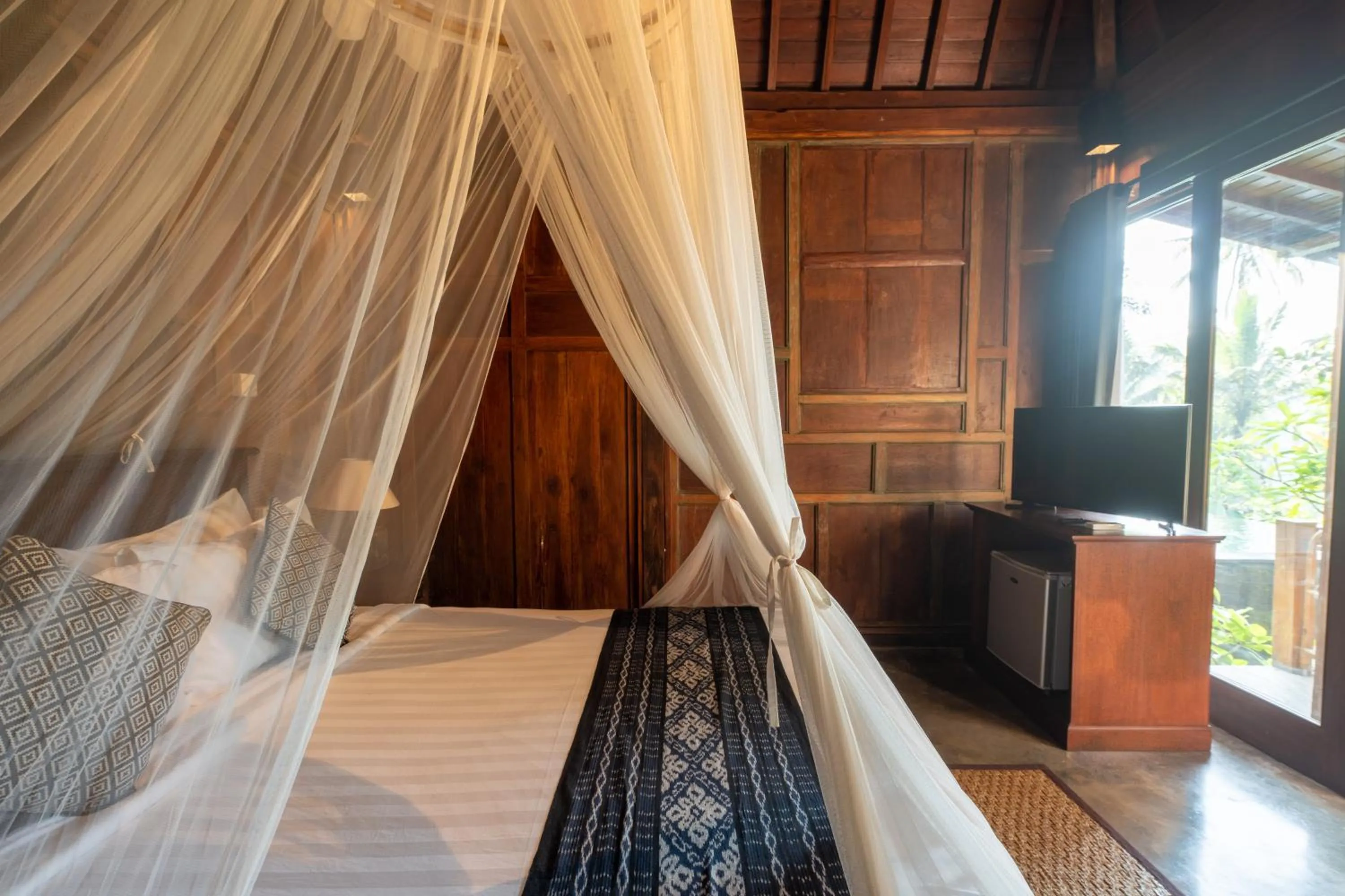 Communal lounge/ TV room, Bed in Sebatu Tulen Villa