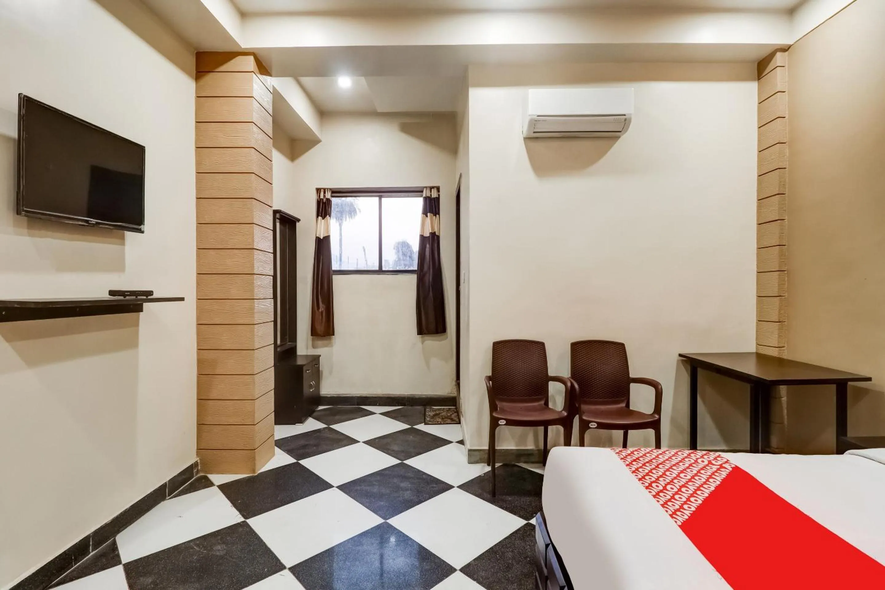 Bedroom in Hotel O Mini Punjab Hills