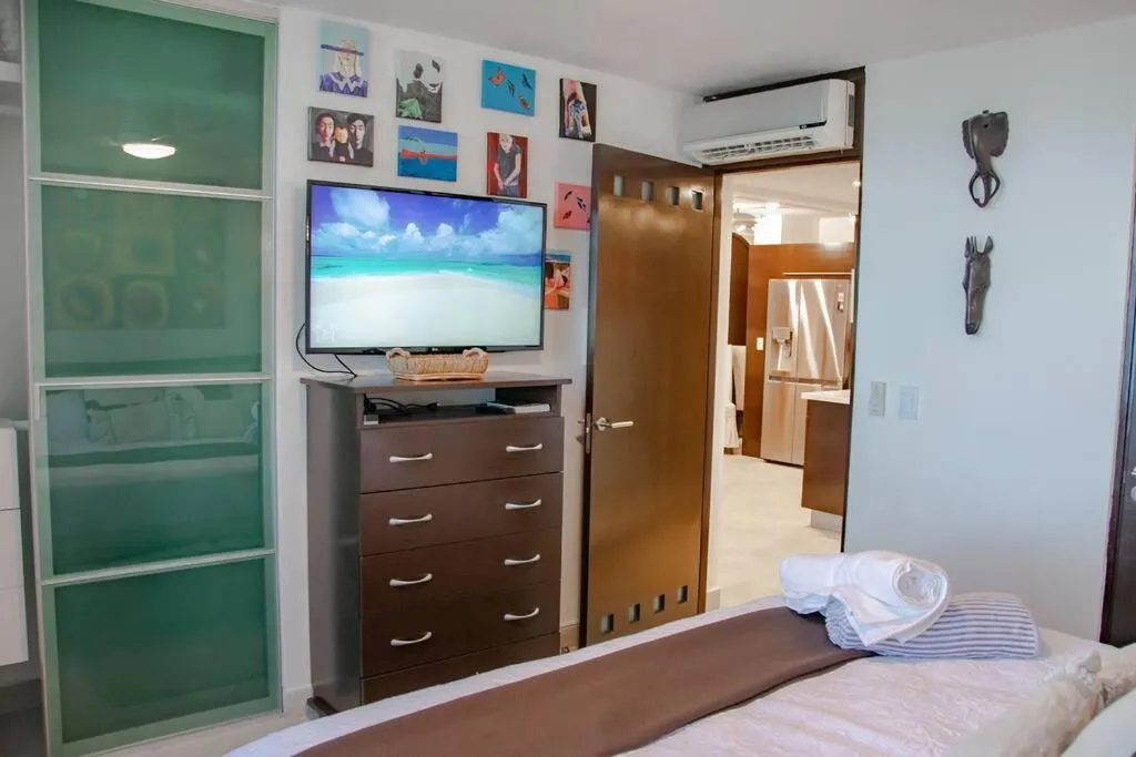 Bed in Depa Bliss · Luxurious getaway at beach paradise Cancún