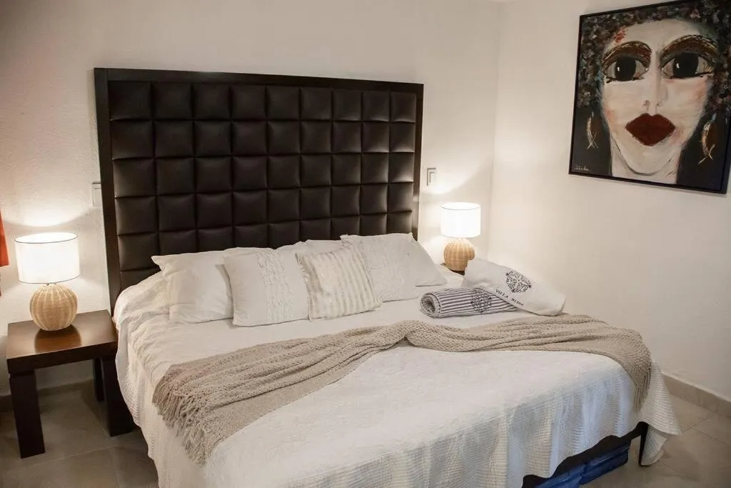 Bed in Depa Bliss · Luxurious getaway at beach paradise Cancún