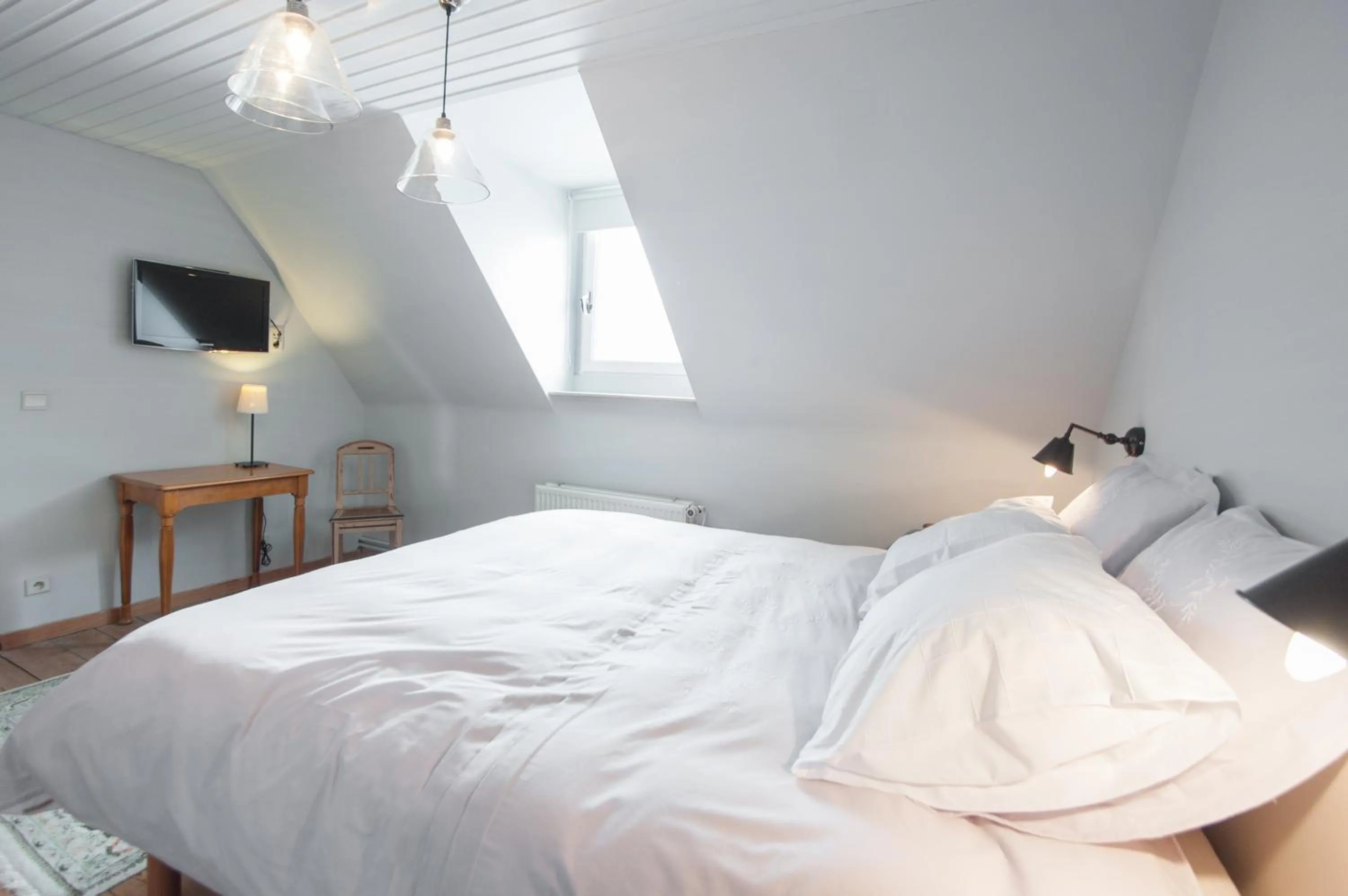 Bed in B&B Cense de la Tour