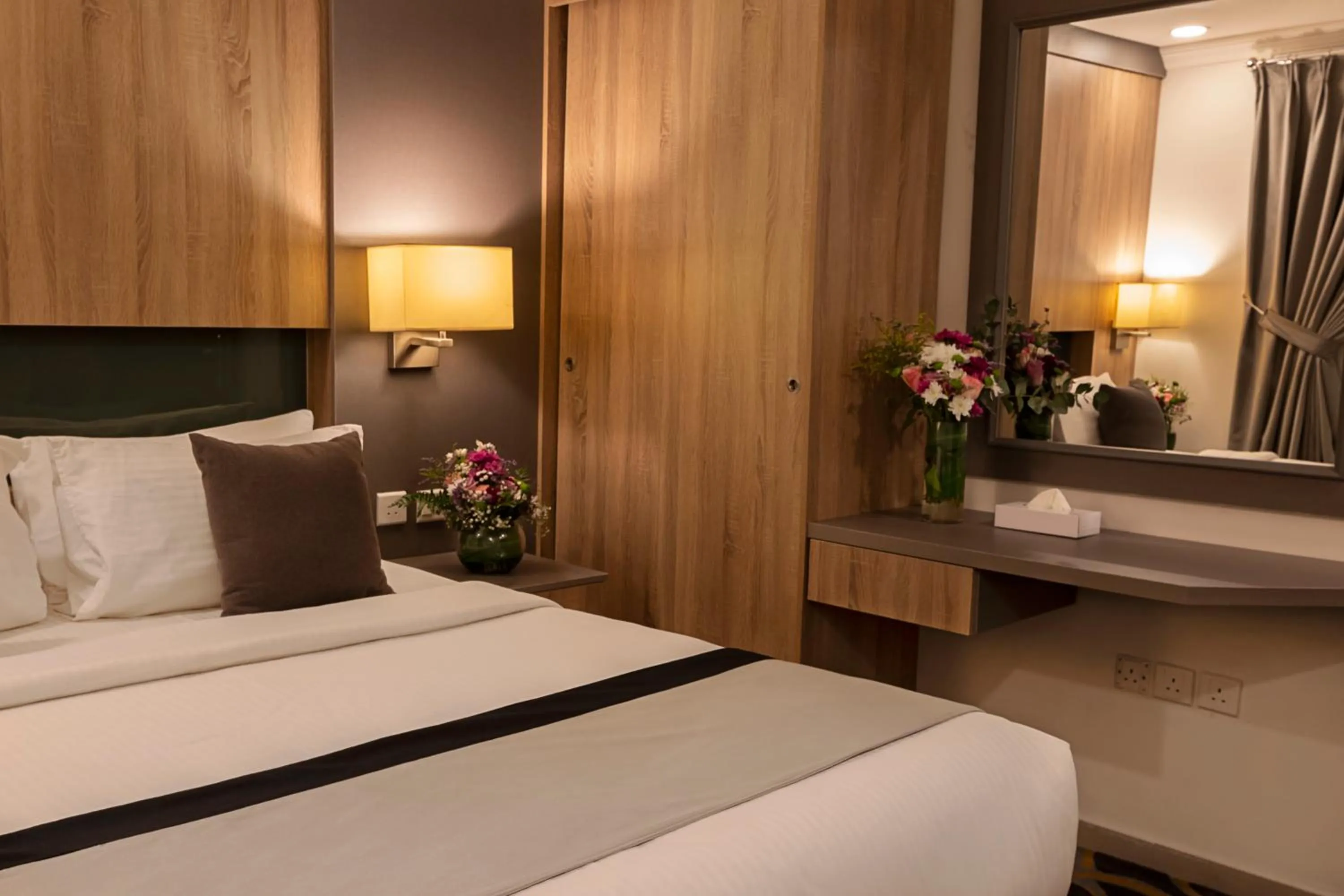 Bed in Laten Suites Prince Sultan