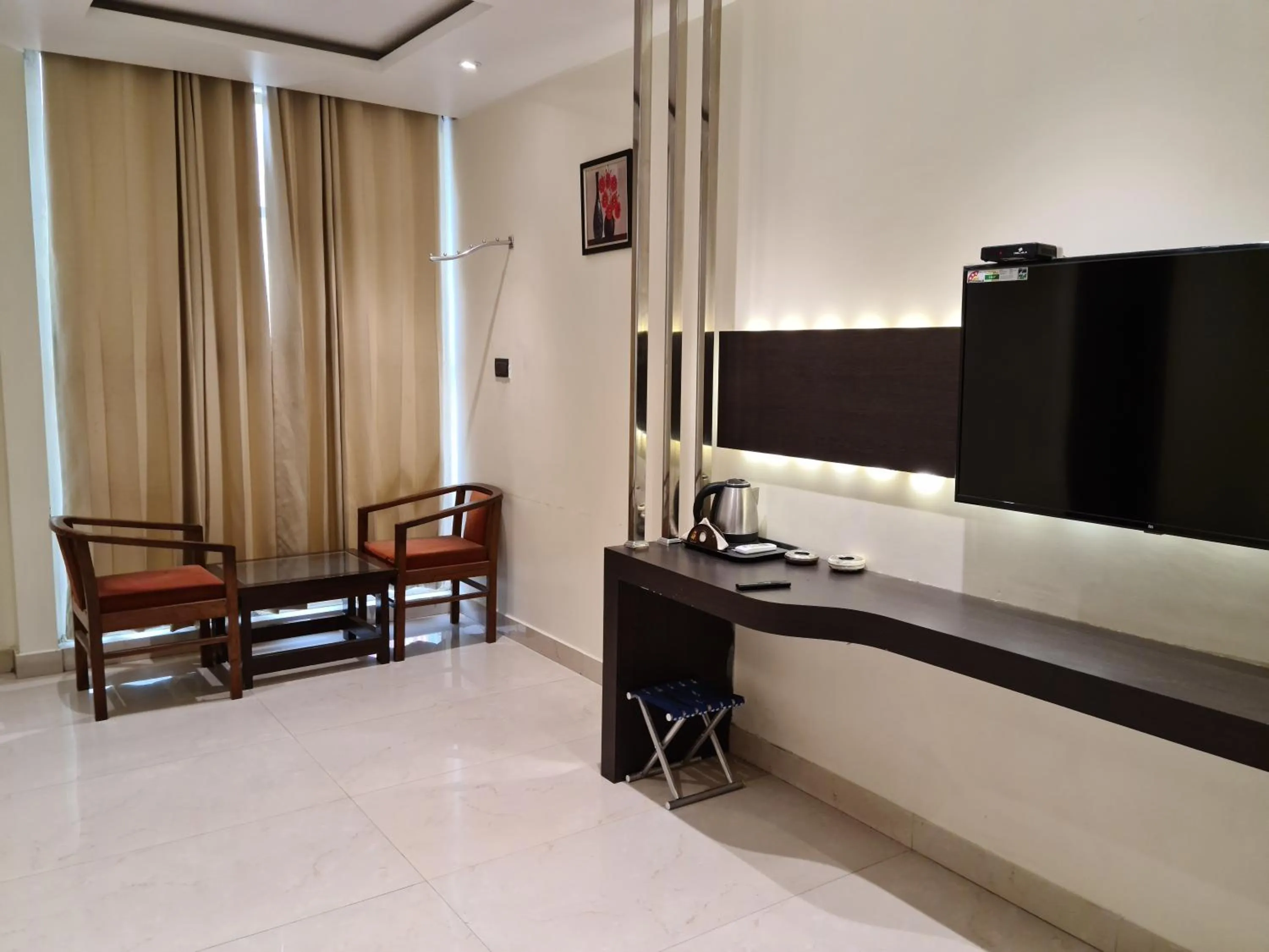 Communal lounge/ TV room in Hotel Star Inn