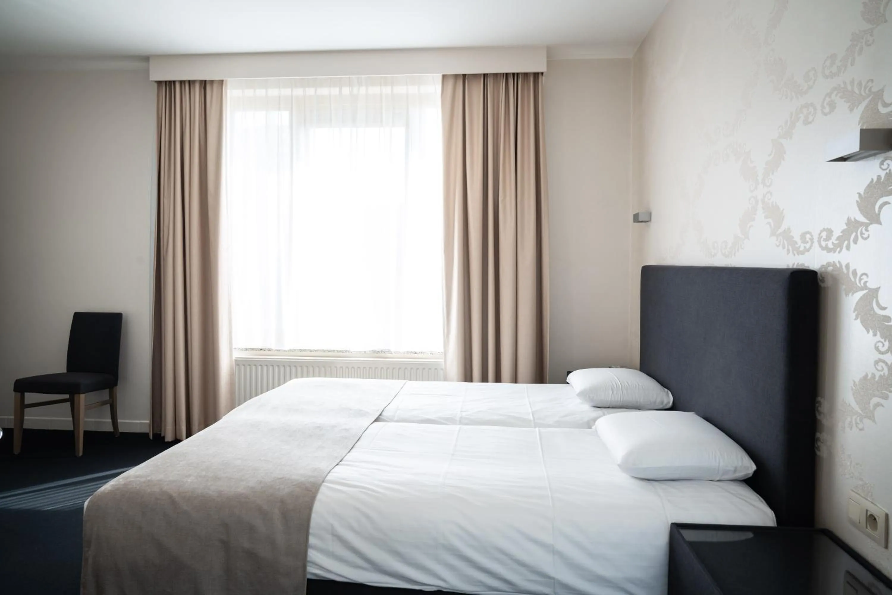 Bed in Hotel Essenza