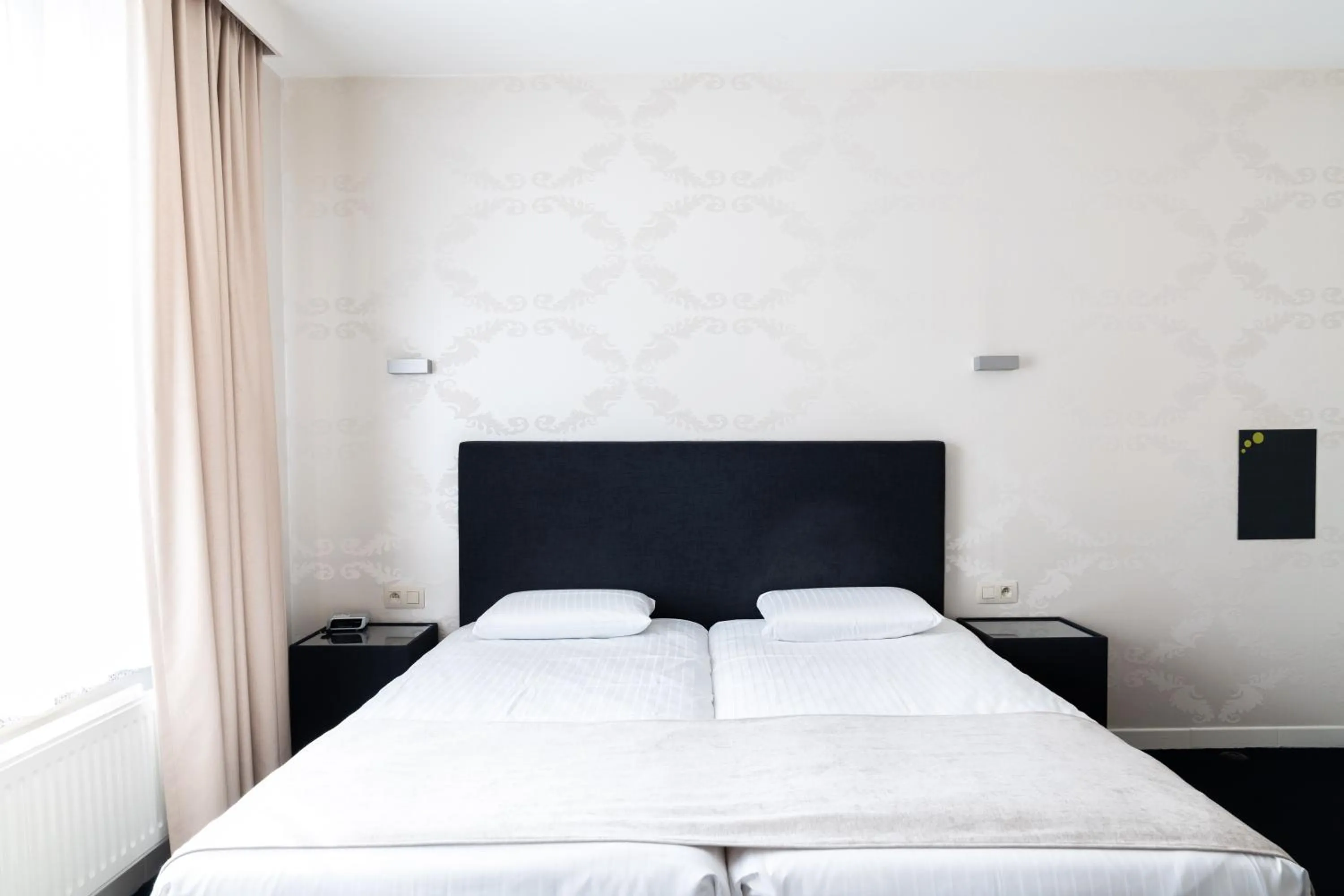 Bed in Hotel Essenza