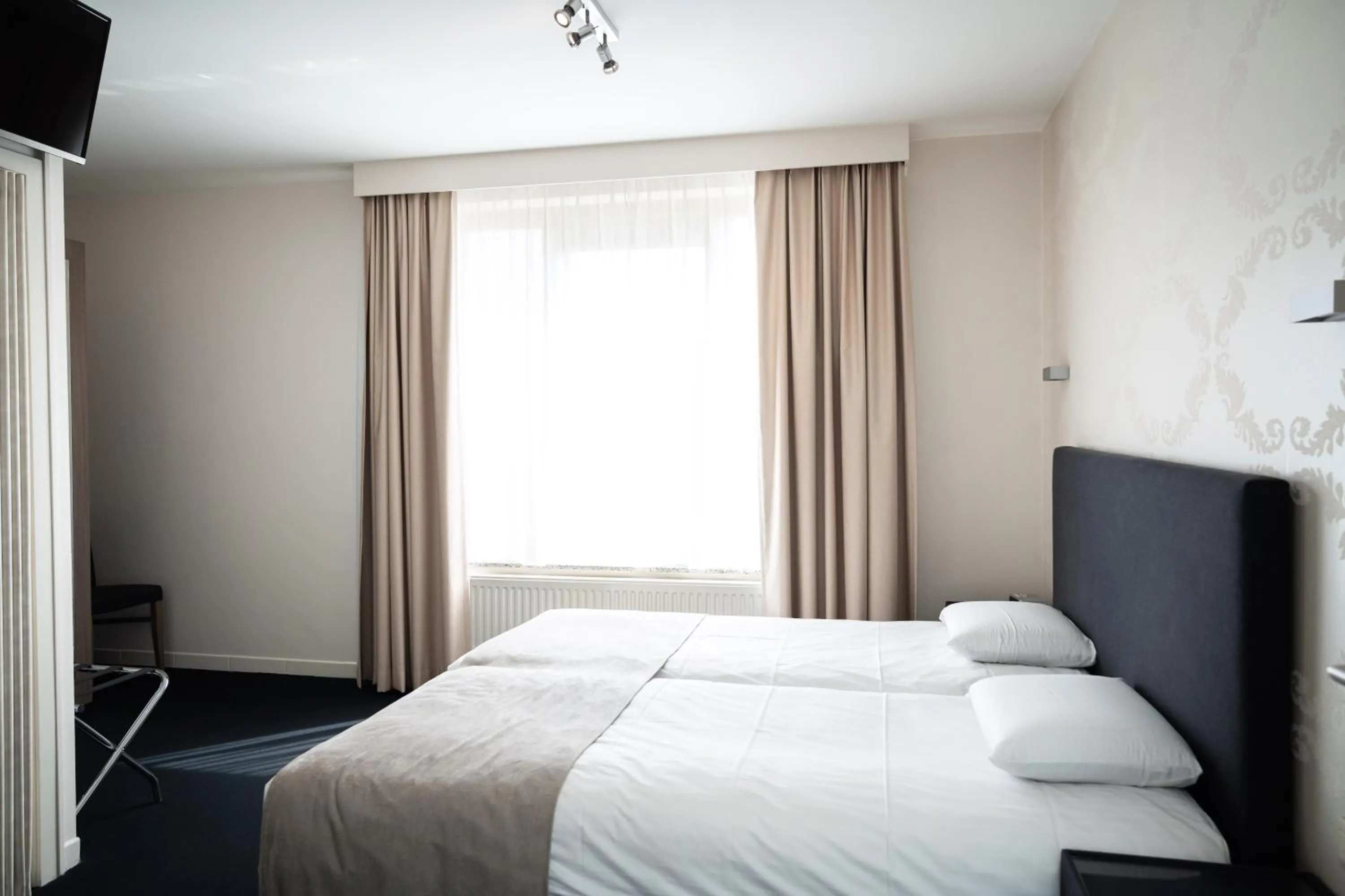 Bed in Hotel Essenza