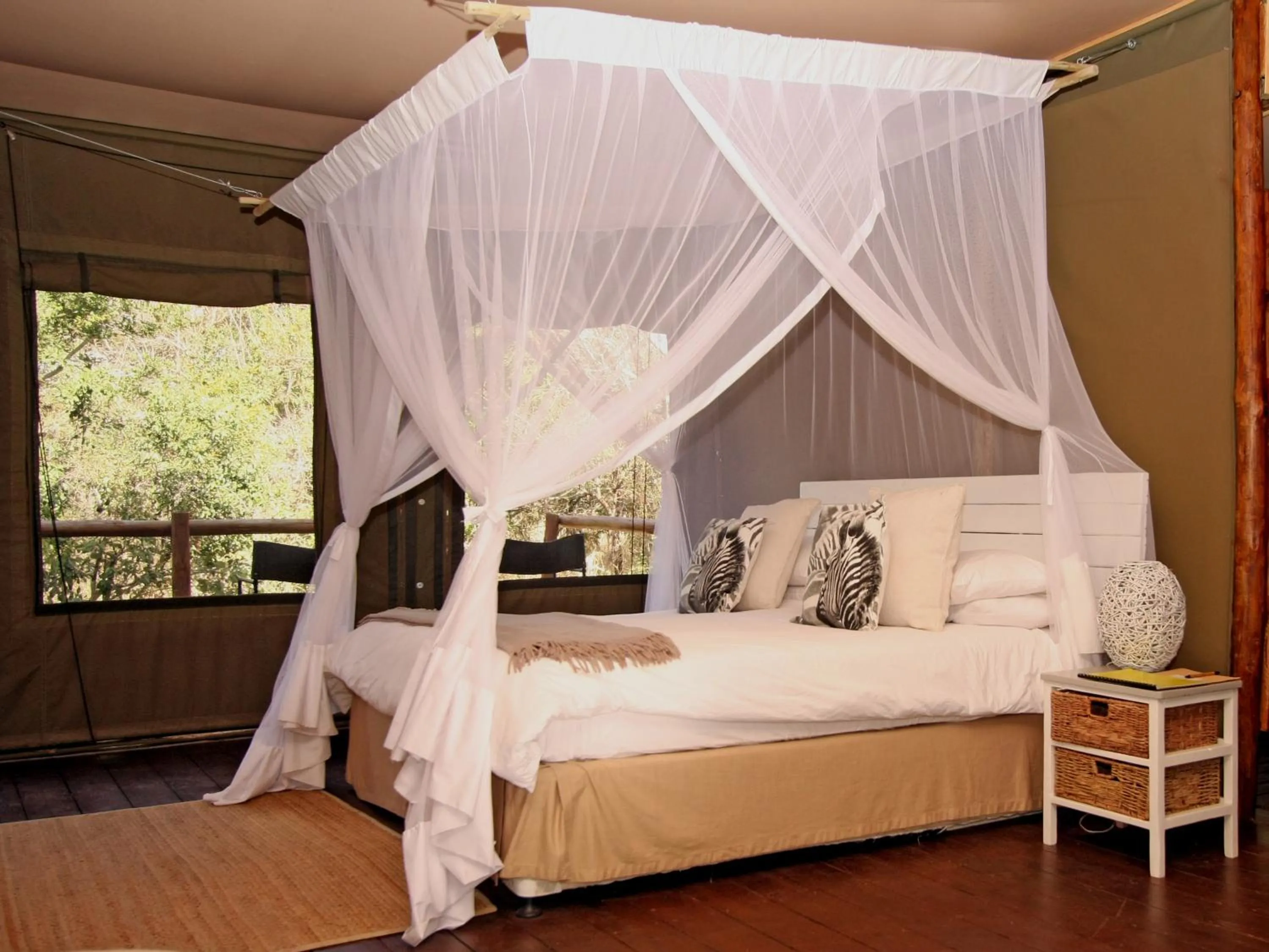 Bed in Ngama Tented Safari Lodge