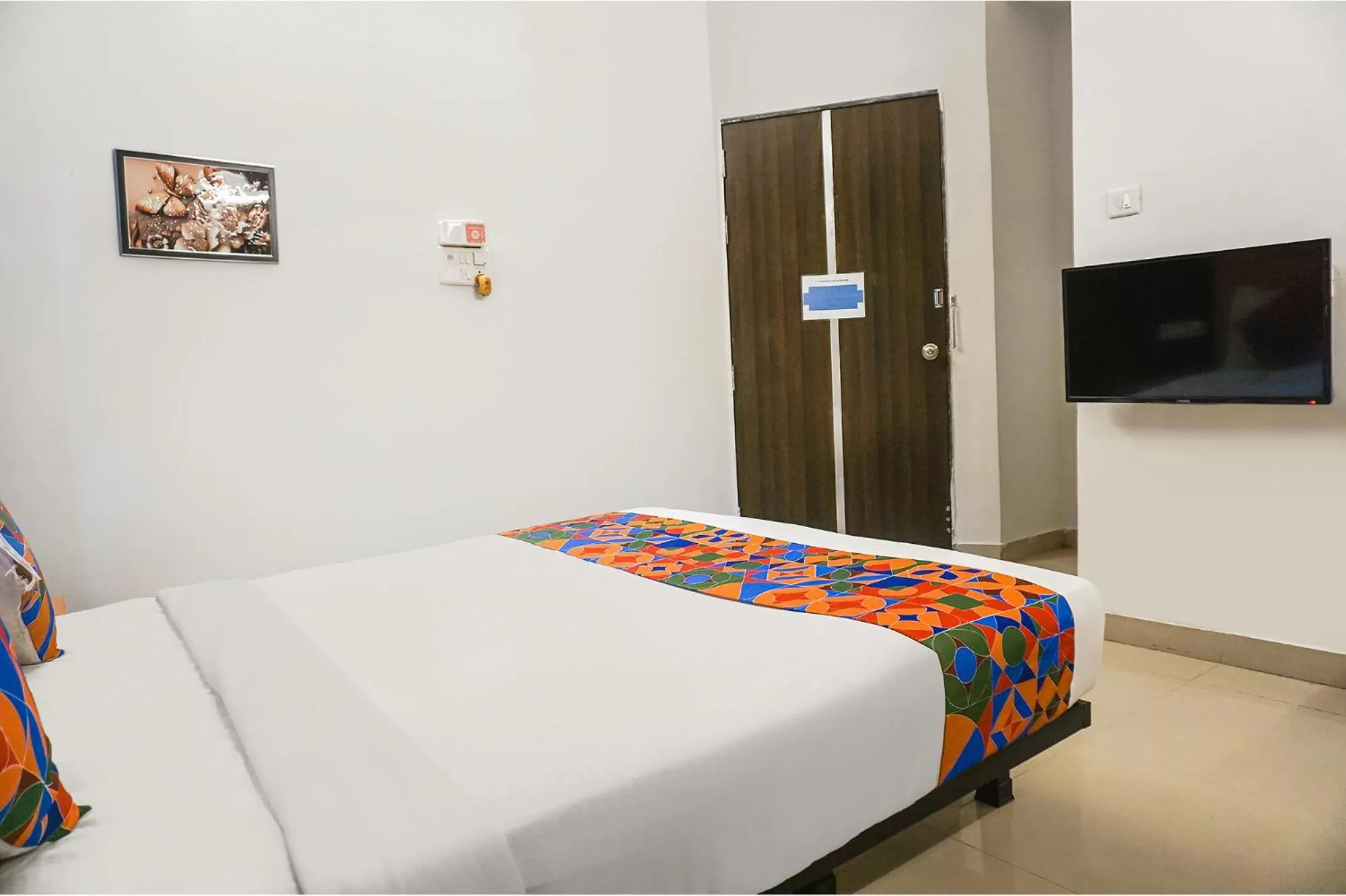 Bed in FabHotel Aura Homes - Nr Khandoba Mandir
