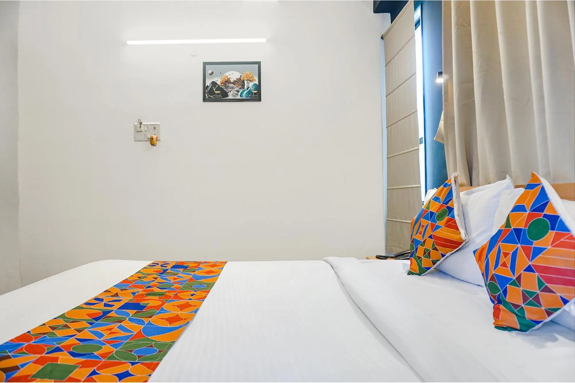 Bed in FabHotel Aura Homes - Nr Khandoba Mandir