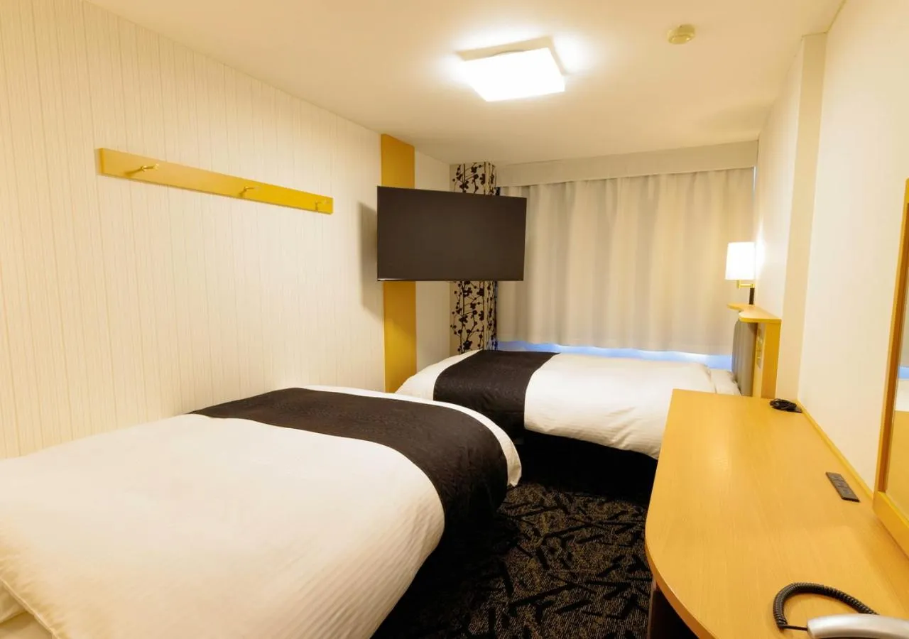 Photo of the whole room, Bed in APA Hotel Kokuraeki Shinkansenguchi