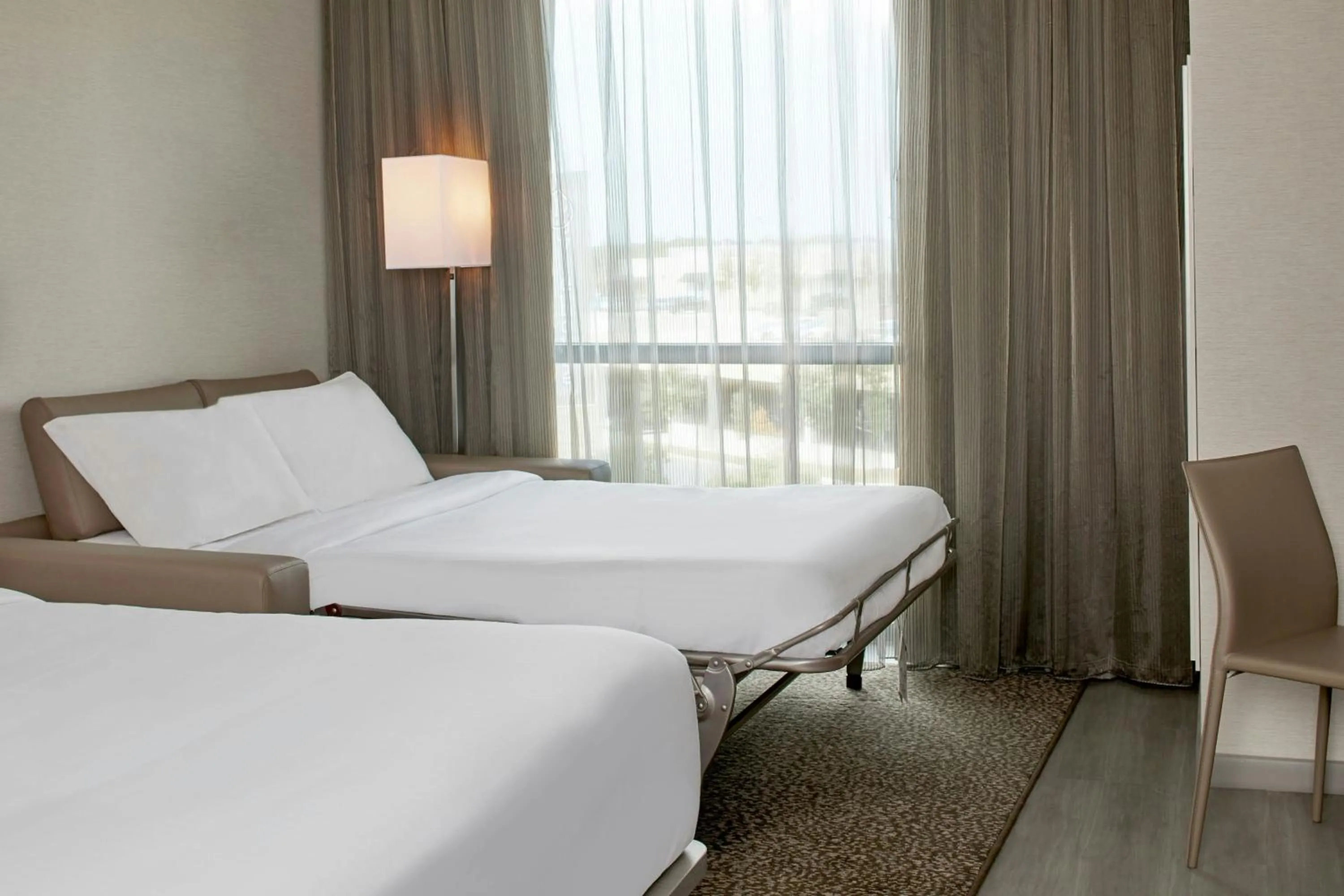 Photo of the whole room, Bed in AC Hotel by Marriott Austin Hill Country