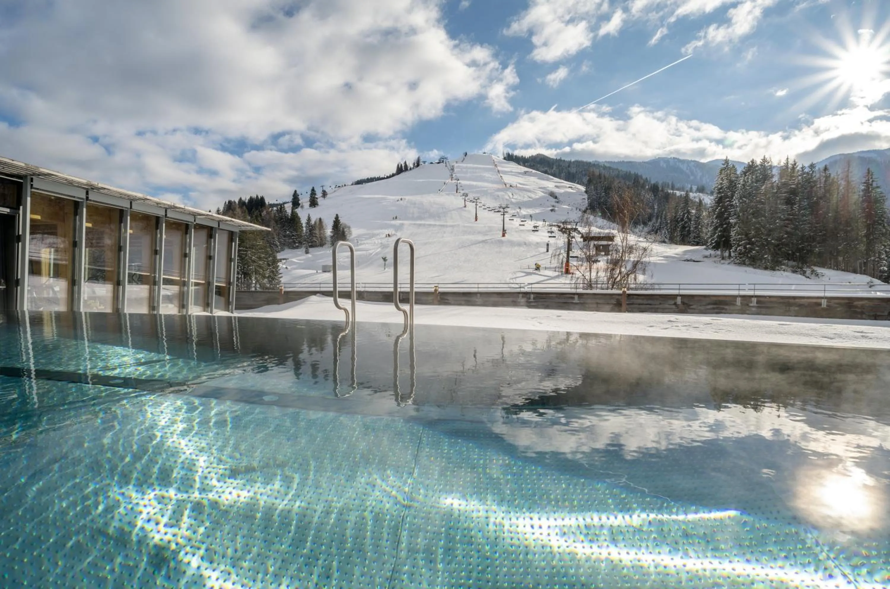 Pool view in Holzhotel Forsthofalm