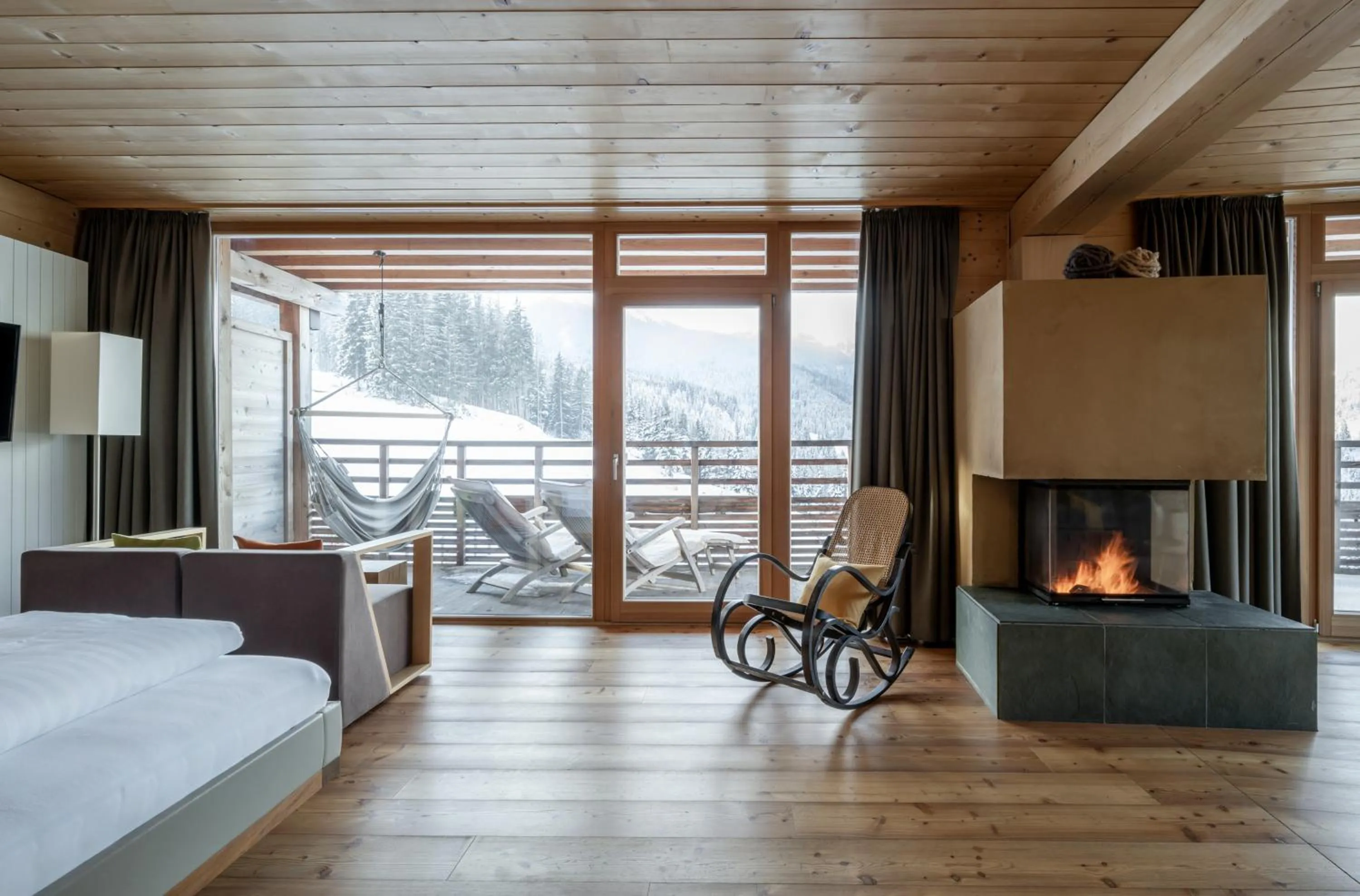 Photo of the whole room, Bed in Holzhotel Forsthofalm