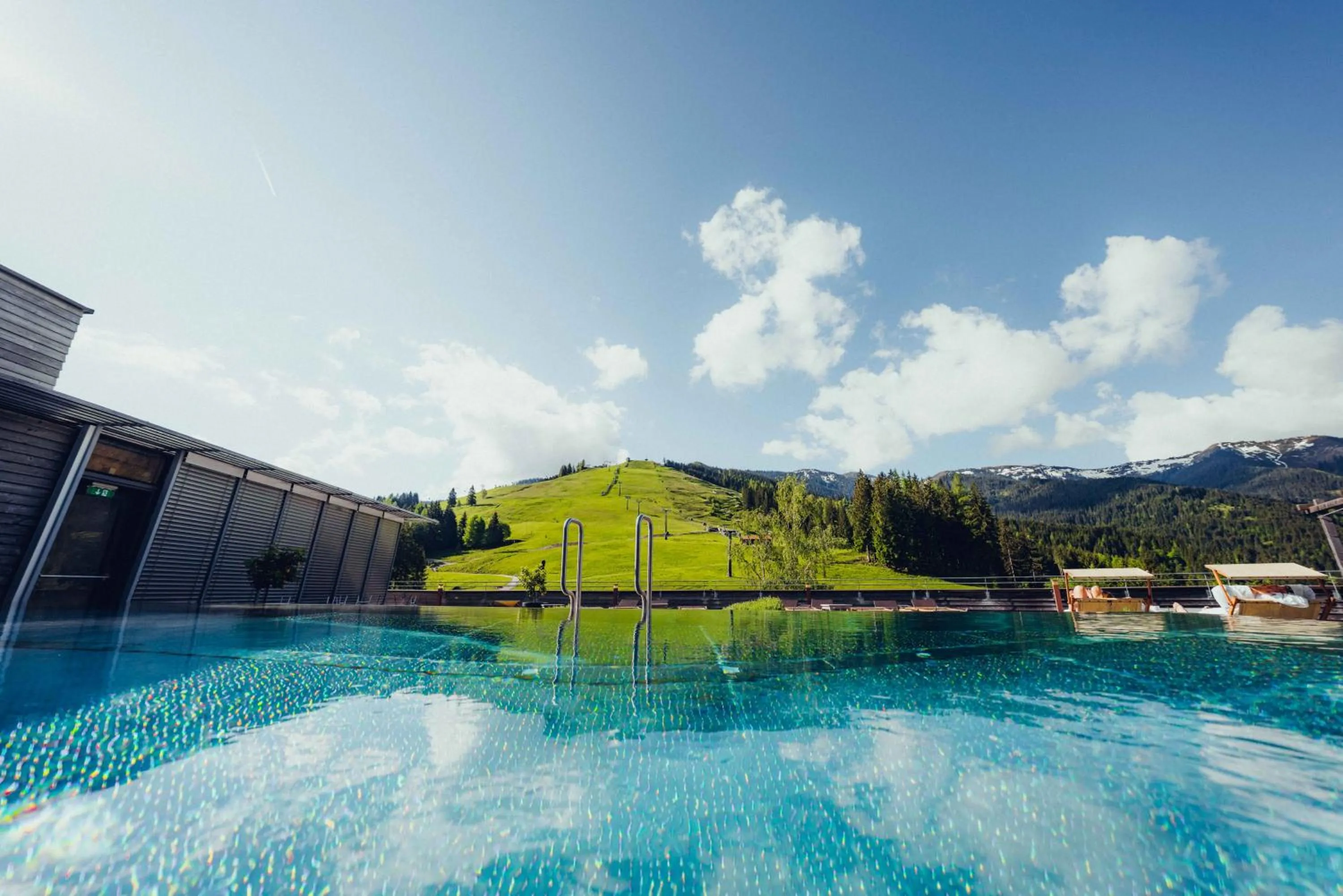 Pool view in Holzhotel Forsthofalm