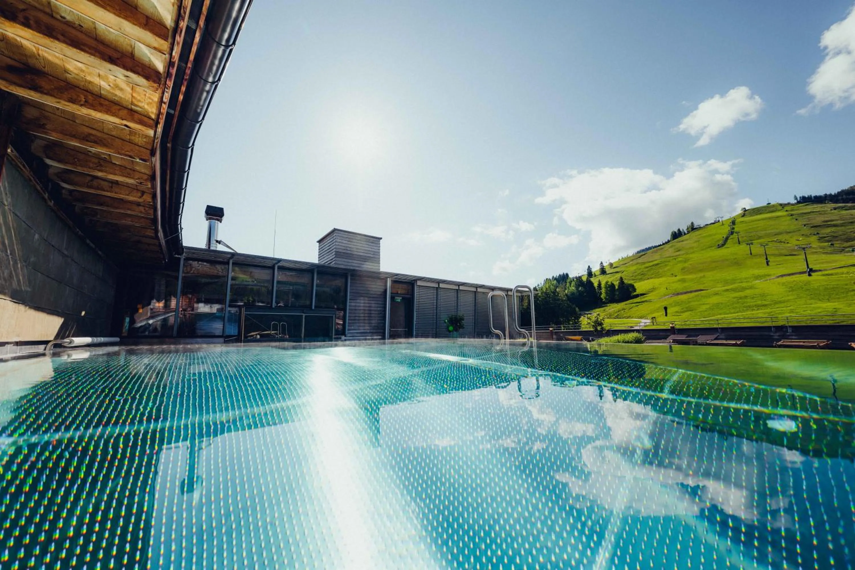 Pool view in Holzhotel Forsthofalm
