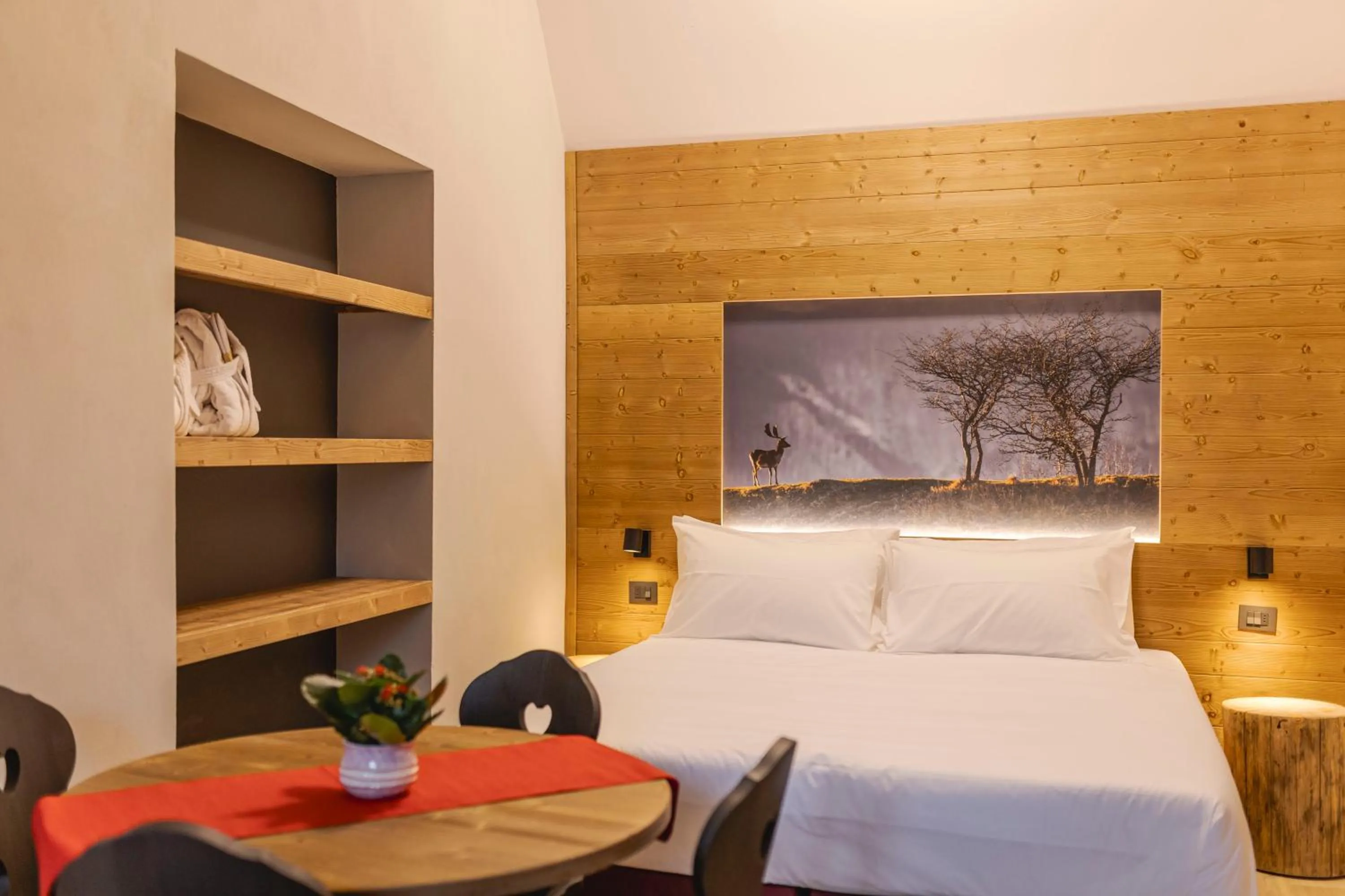 Bed in Granduca Mountain Wellness Apartments Campigna