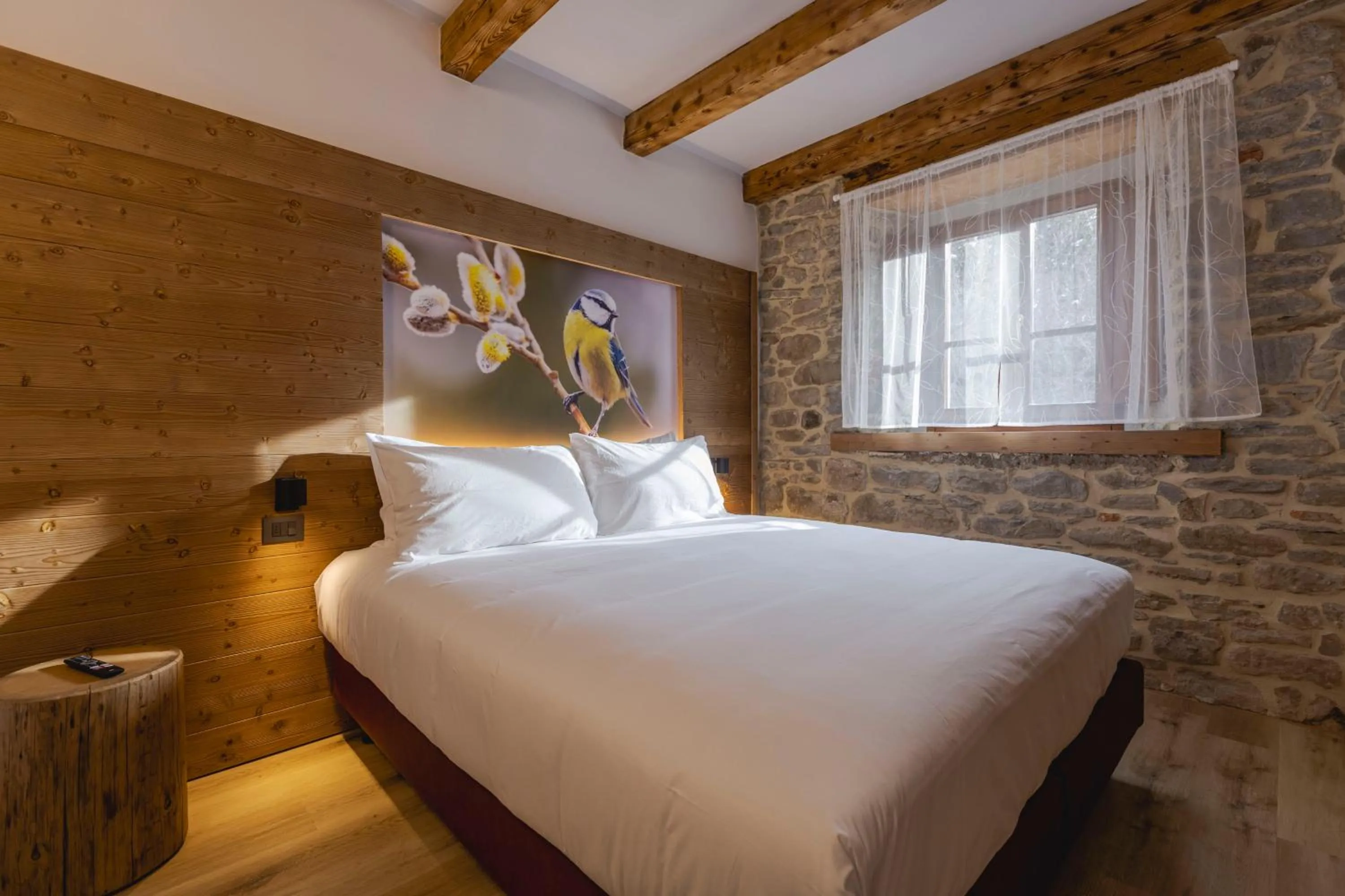 Bed in Granduca Mountain Wellness Apartments Campigna