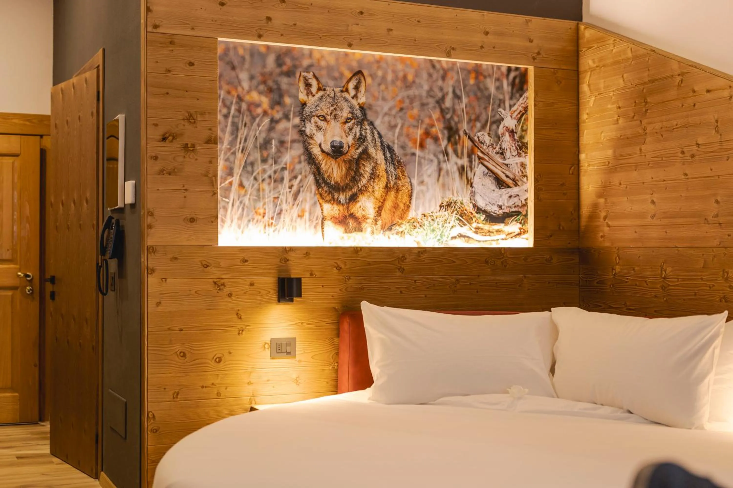 Decorative detail, Bed in Granduca Mountain Wellness Apartments Campigna