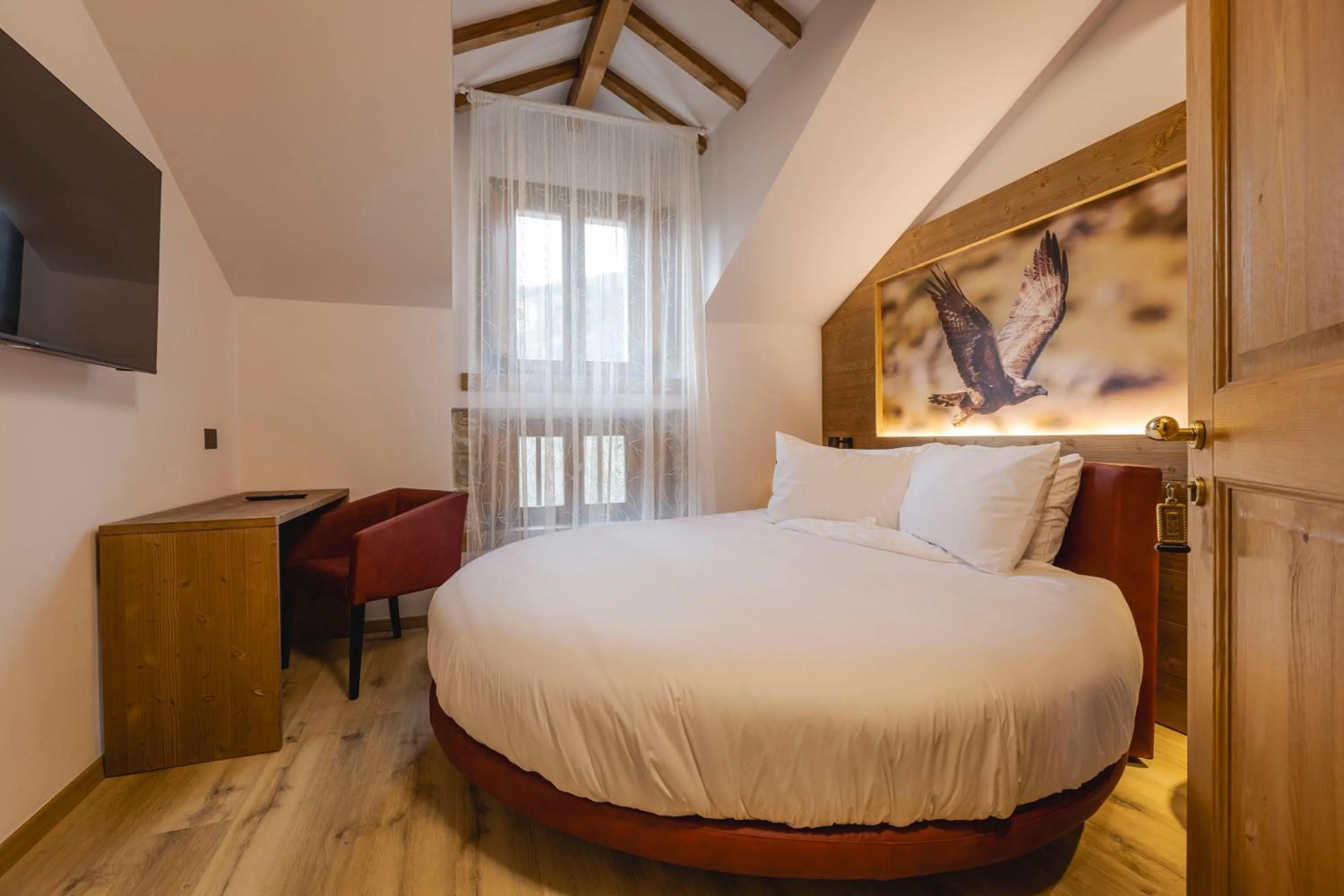 Bed in Granduca Mountain Wellness Apartments Campigna