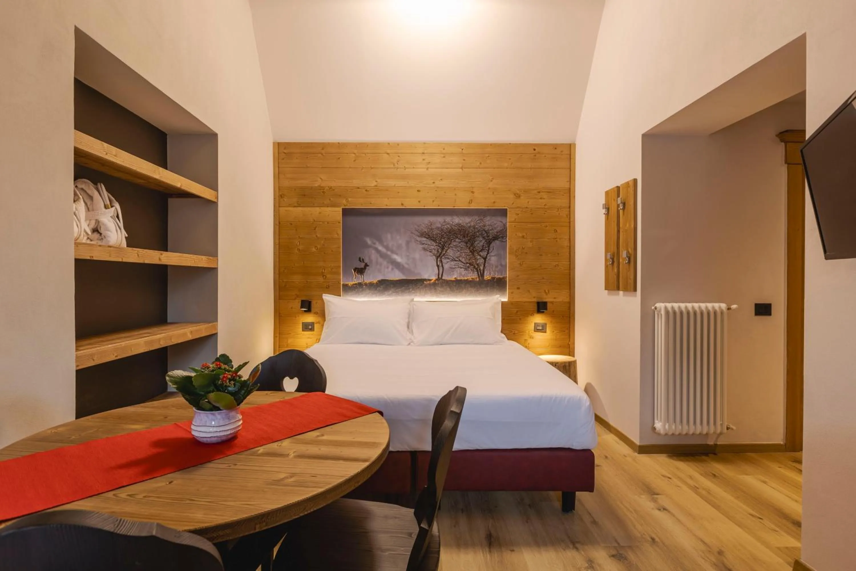 Bed in Granduca Mountain Wellness Apartments Campigna