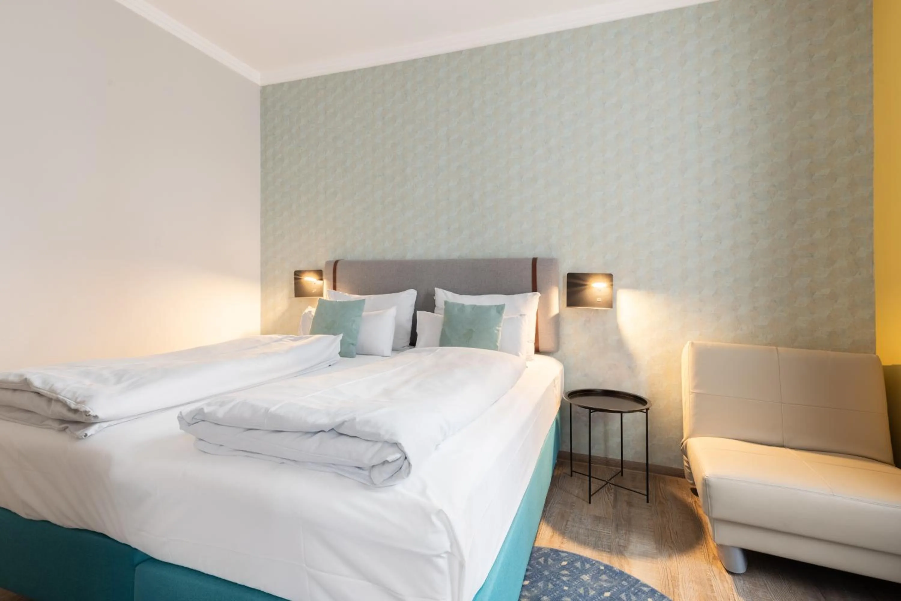 Bed in Garner Hotel Vienna by IHG