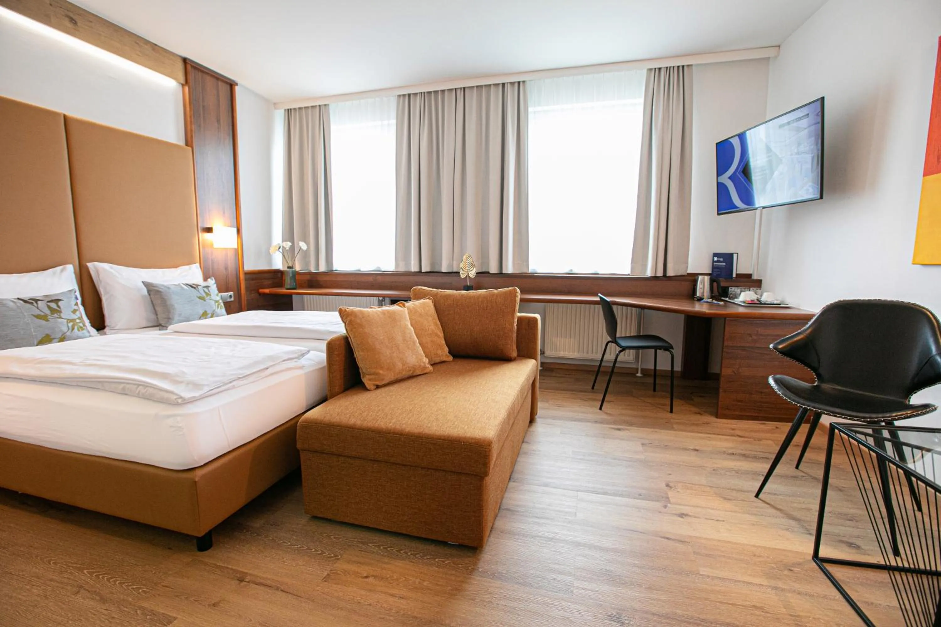 Photo of the whole room, Bed in Das Reinisch Hotel - near Vienna Airport