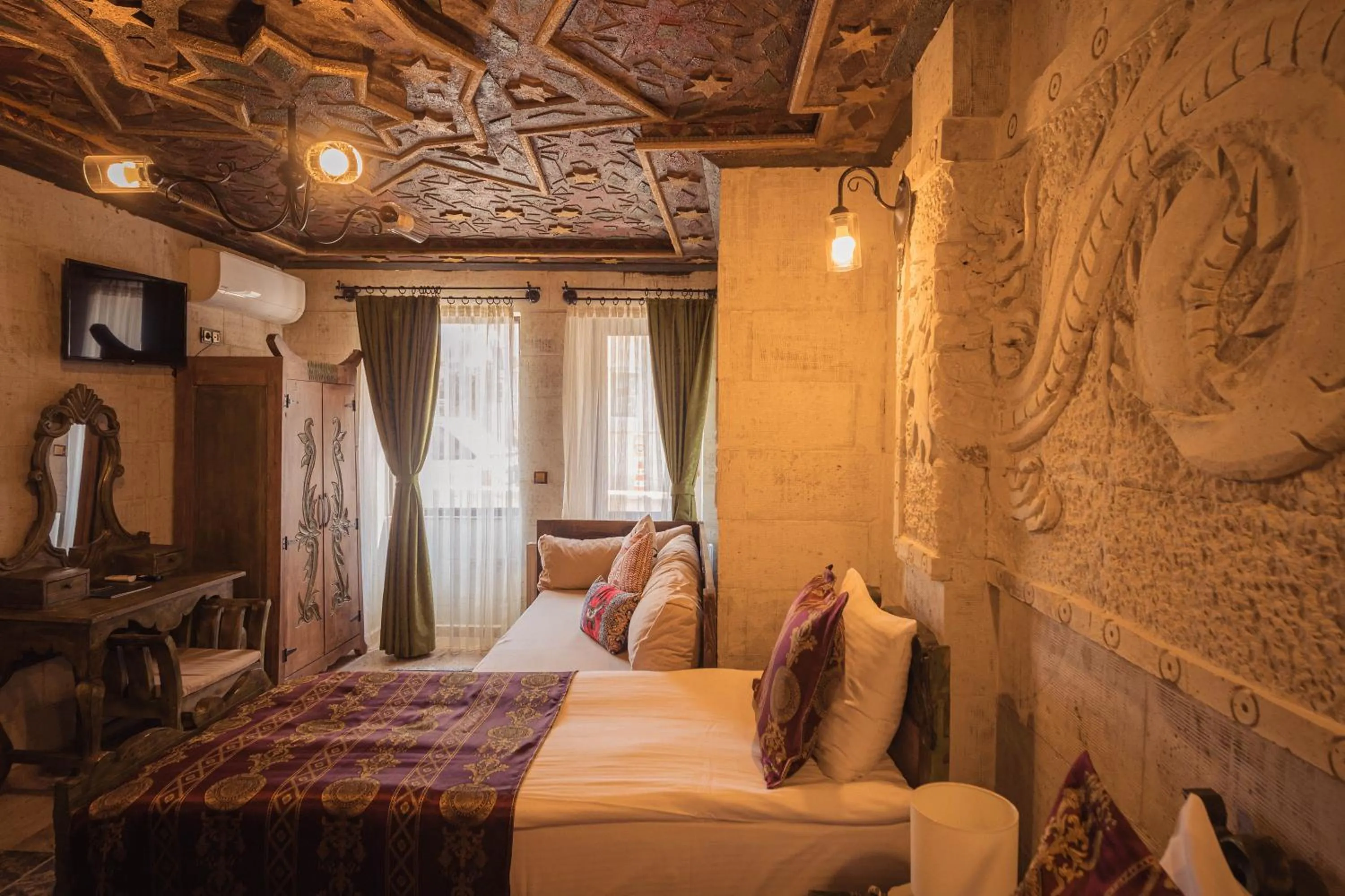 Bed in Olivia Cave Hotel