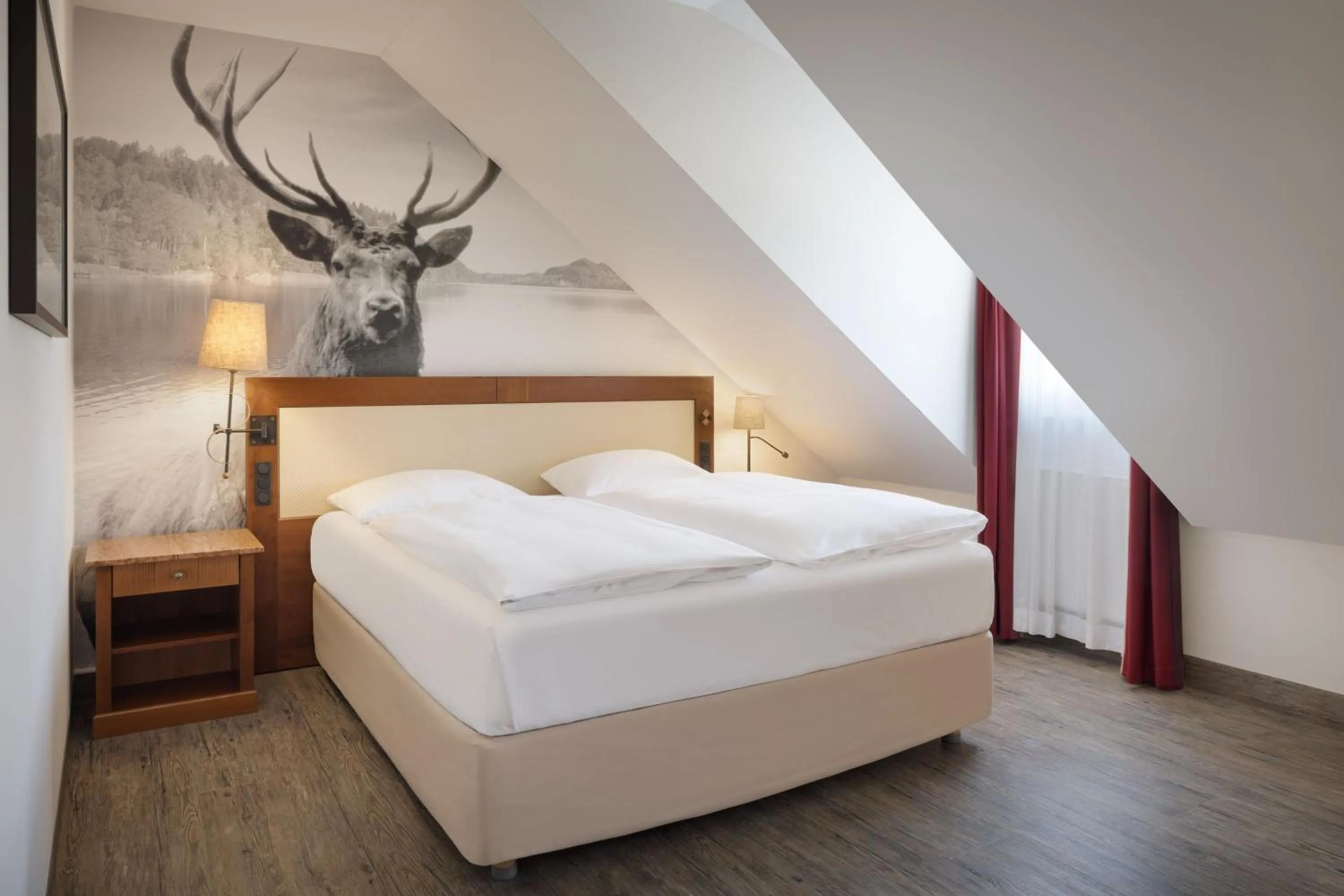 Bedroom, Bed in Arabella Jagdhof Resort am Fuschlsee, a Tribute Portfolio Hotel