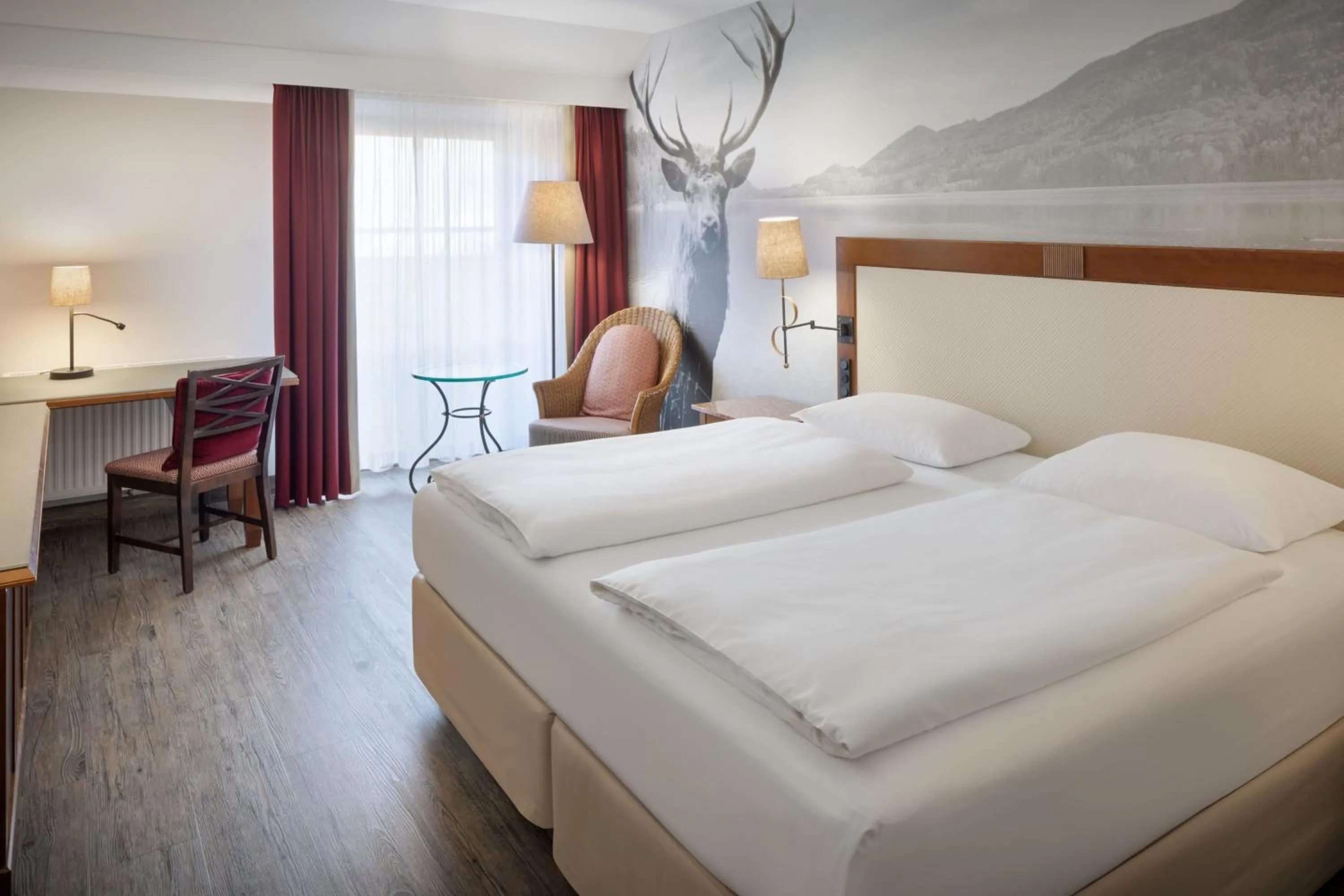 Photo of the whole room, Bed in Arabella Jagdhof Resort am Fuschlsee, a Tribute Portfolio Hotel