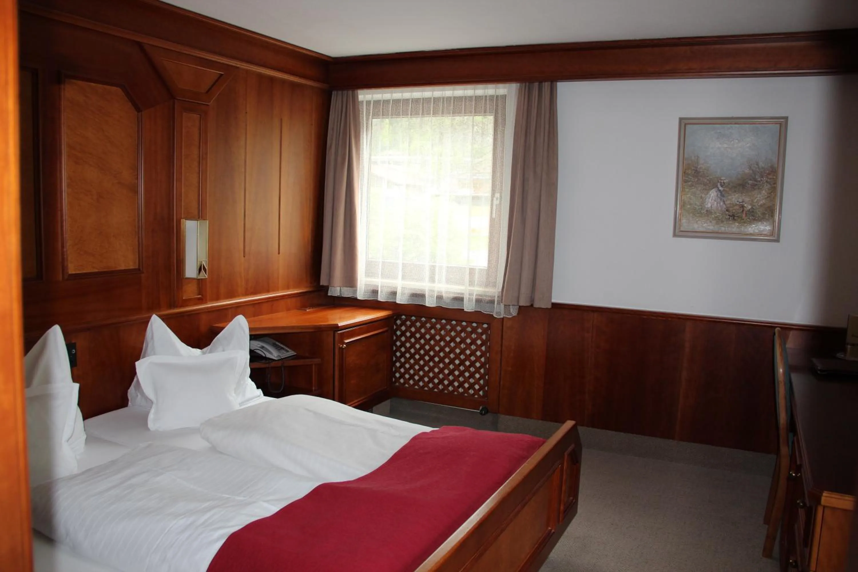 Bed in Hotel Tyrolis