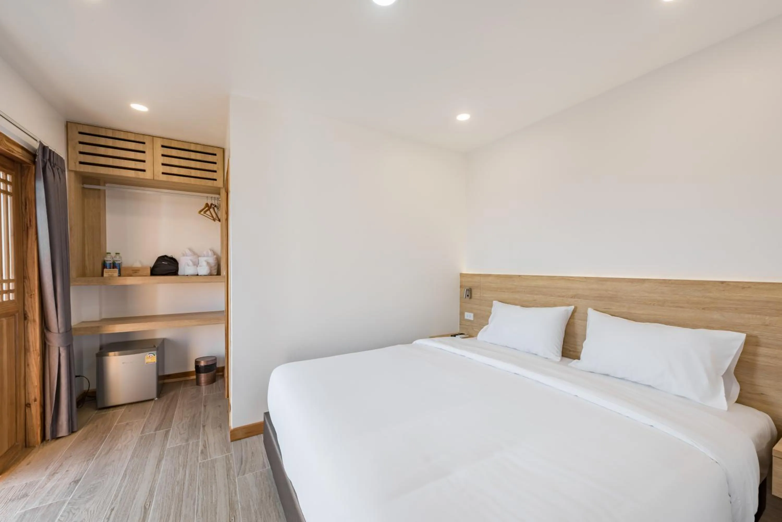 Decorative detail, Bed in Chiangkhan River Walk Hotel