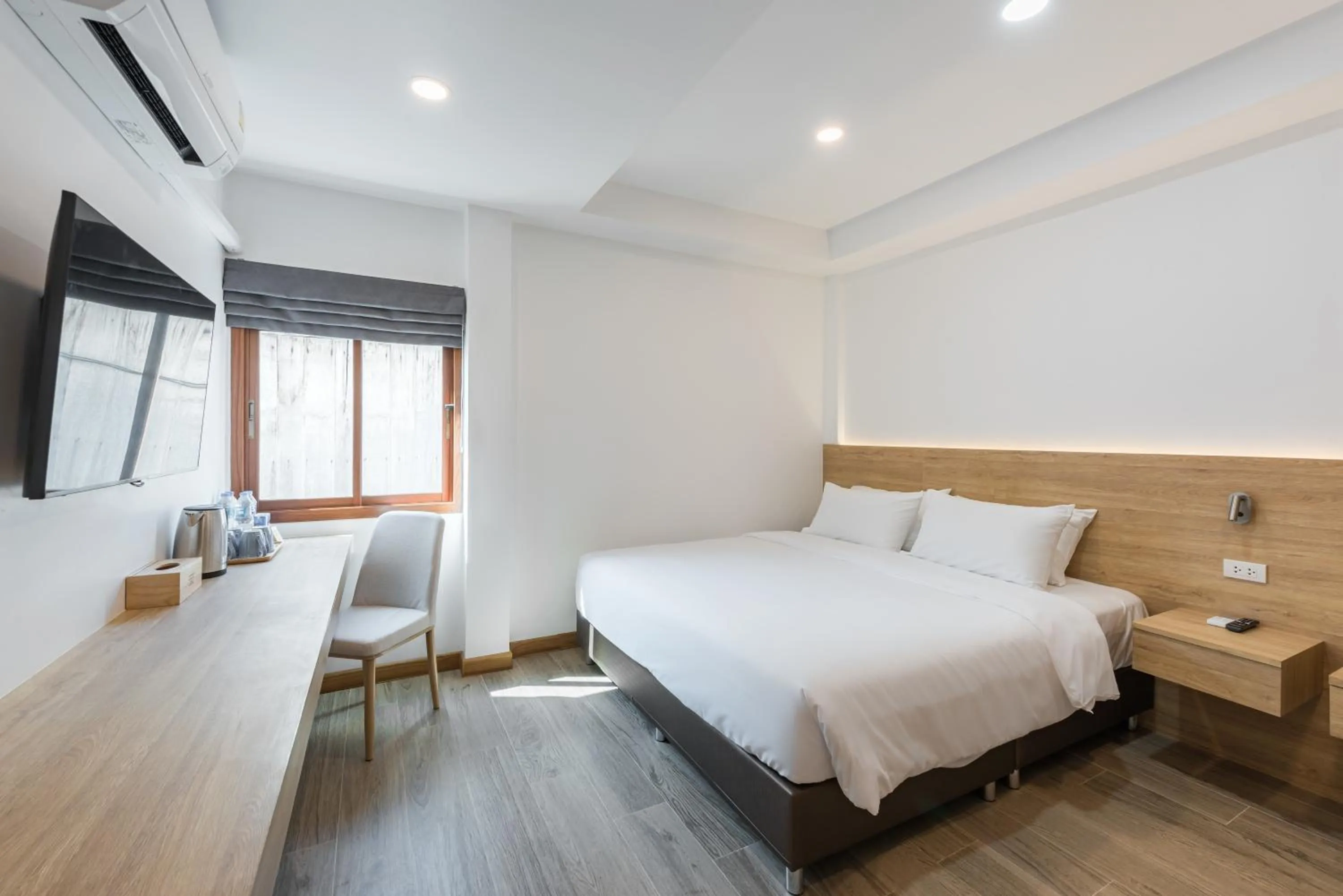 Bed in Chiangkhan River Walk Hotel