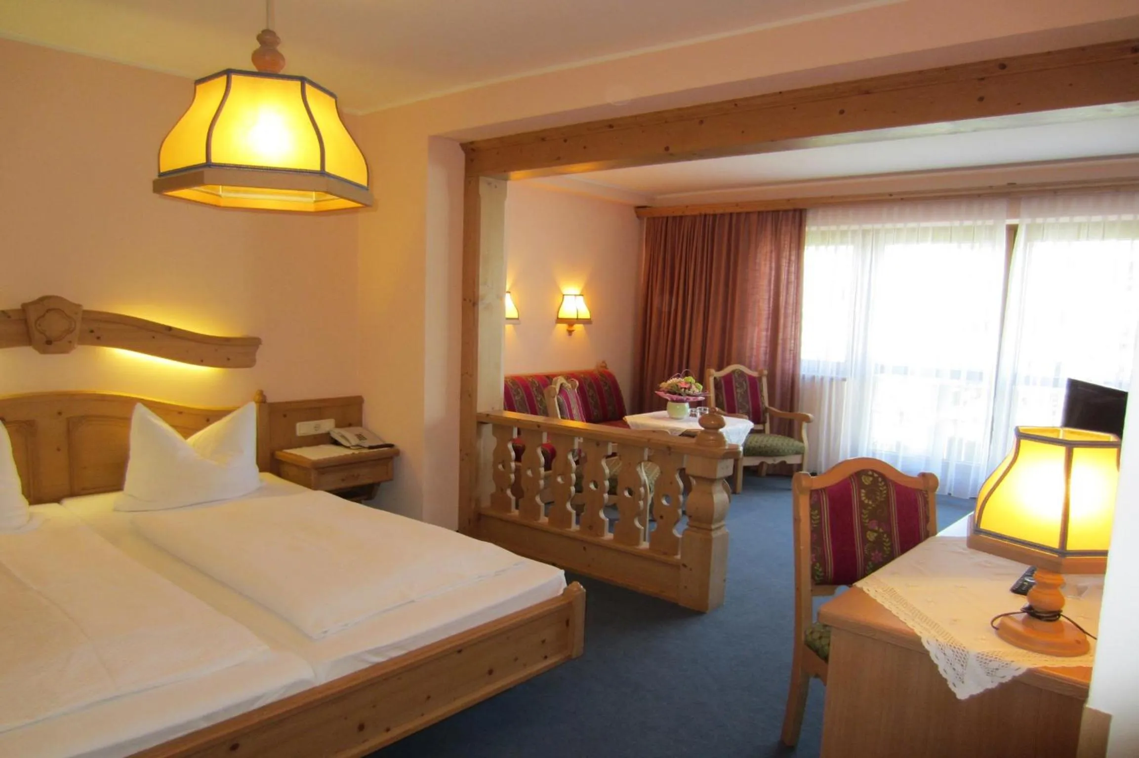 Photo of the whole room, Bed in Hotel Plainbrücke | self check-in