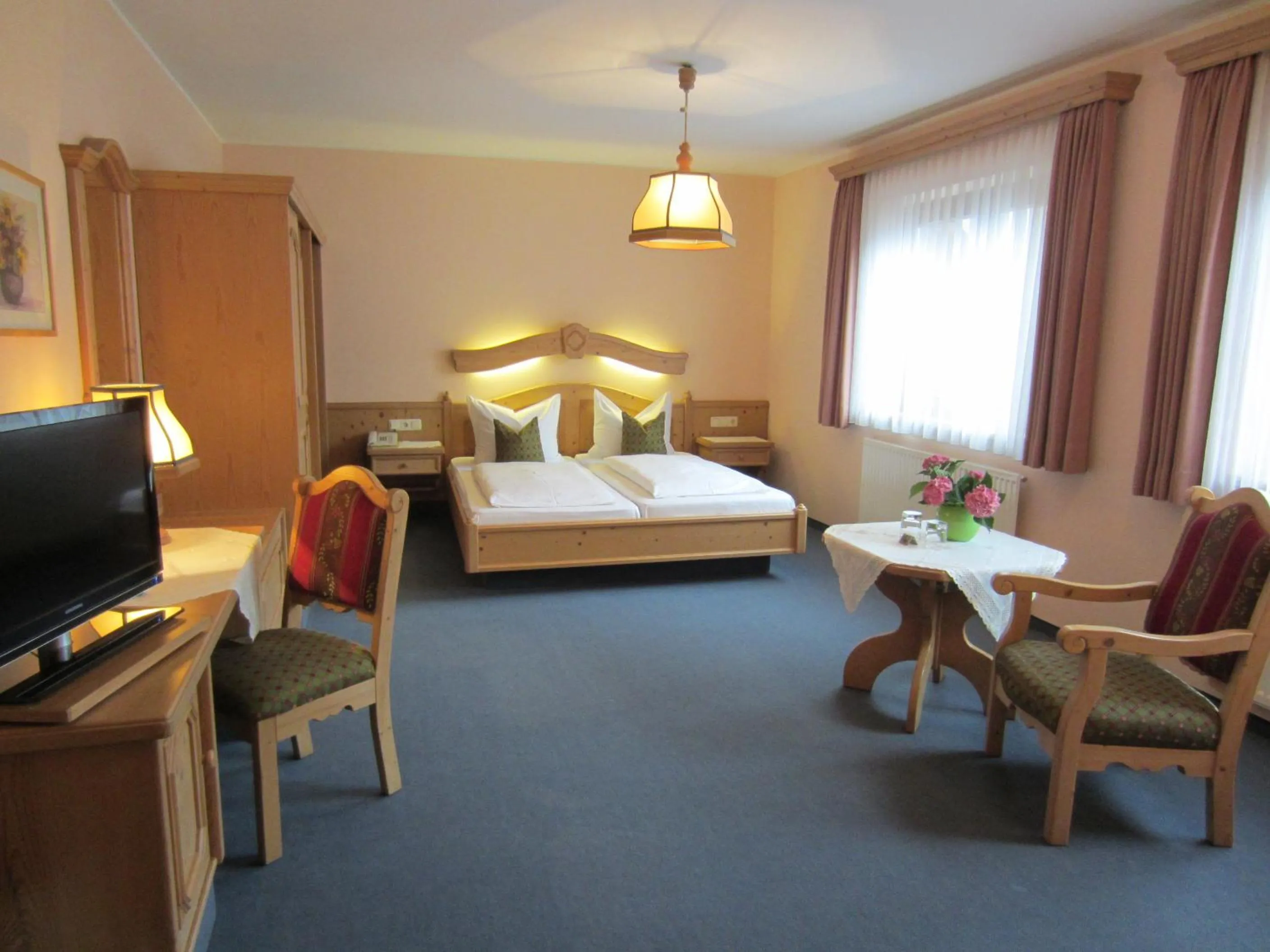 Photo of the whole room, Bed in Hotel Plainbrücke | self check-in