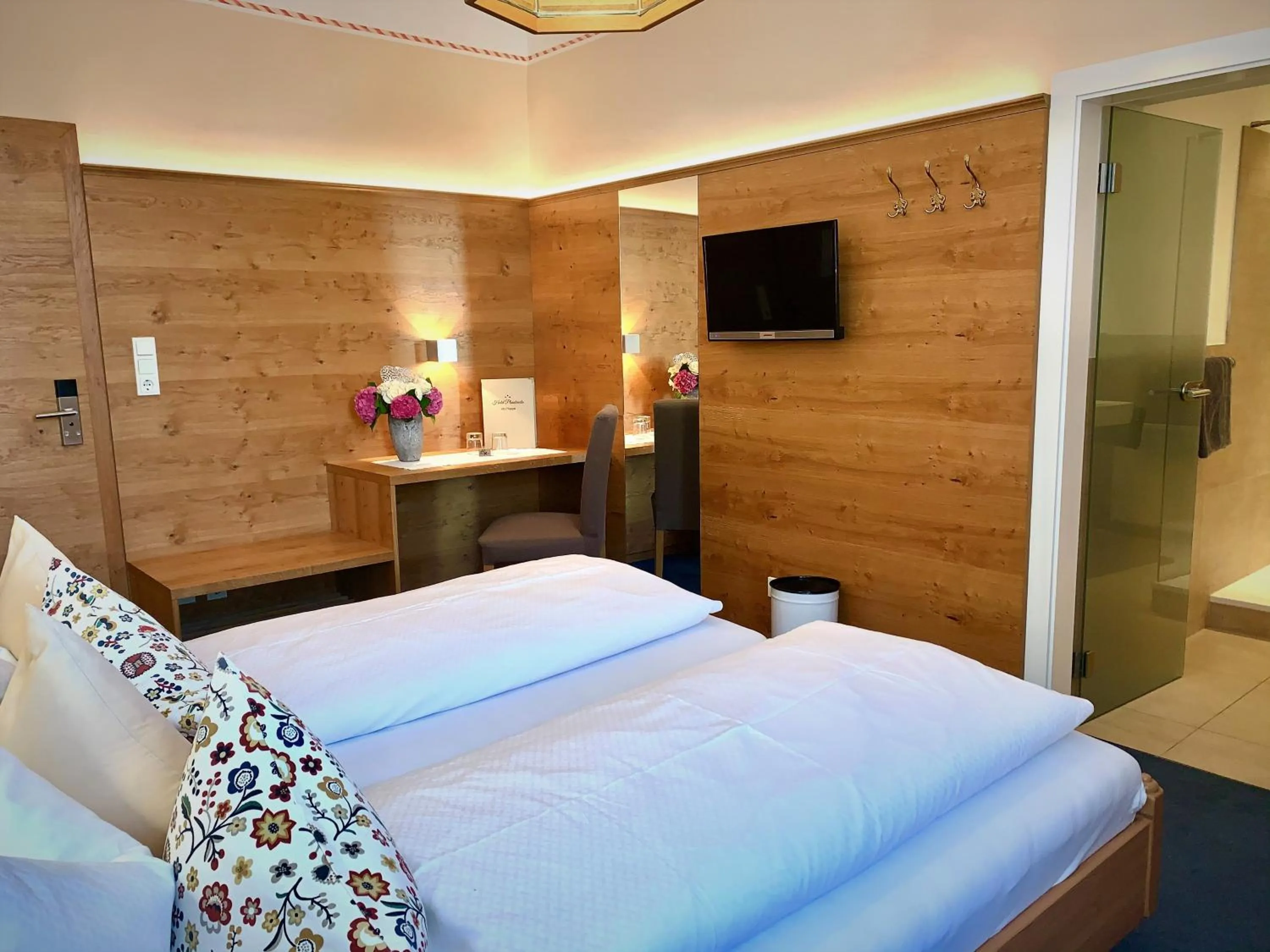 Photo of the whole room, Bed in Hotel Plainbrücke | self check-in