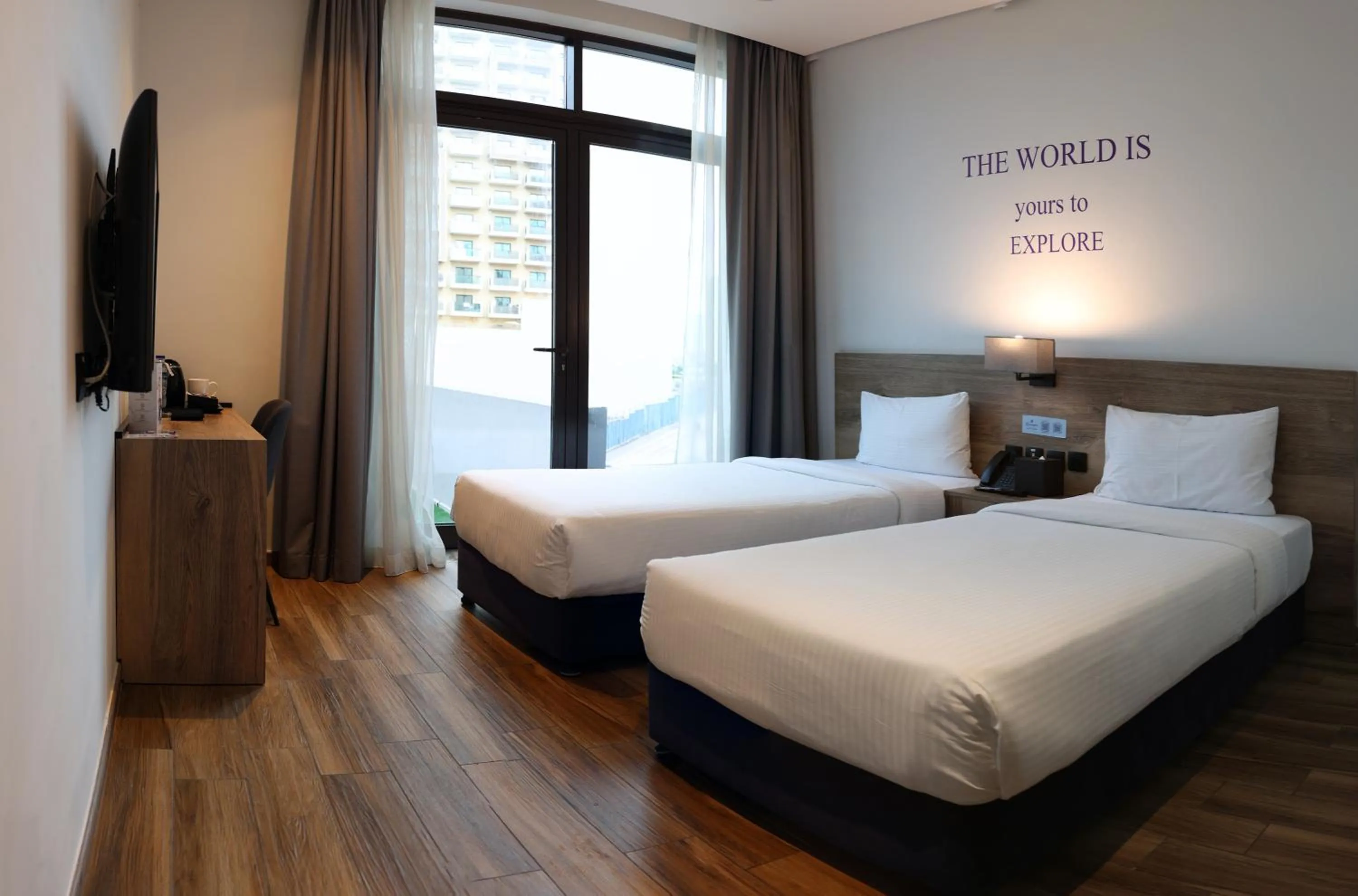 Bed in Kingsgate Al Jaddaf Hotel by Millennium