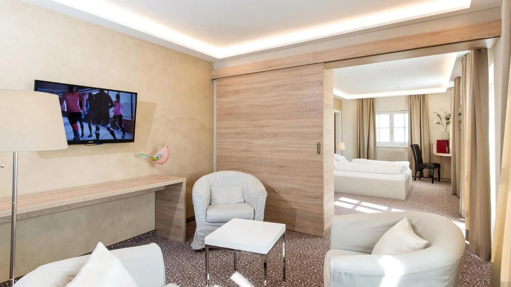 Seating area, Bed in Lust und Laune Hotel am Wörthersee