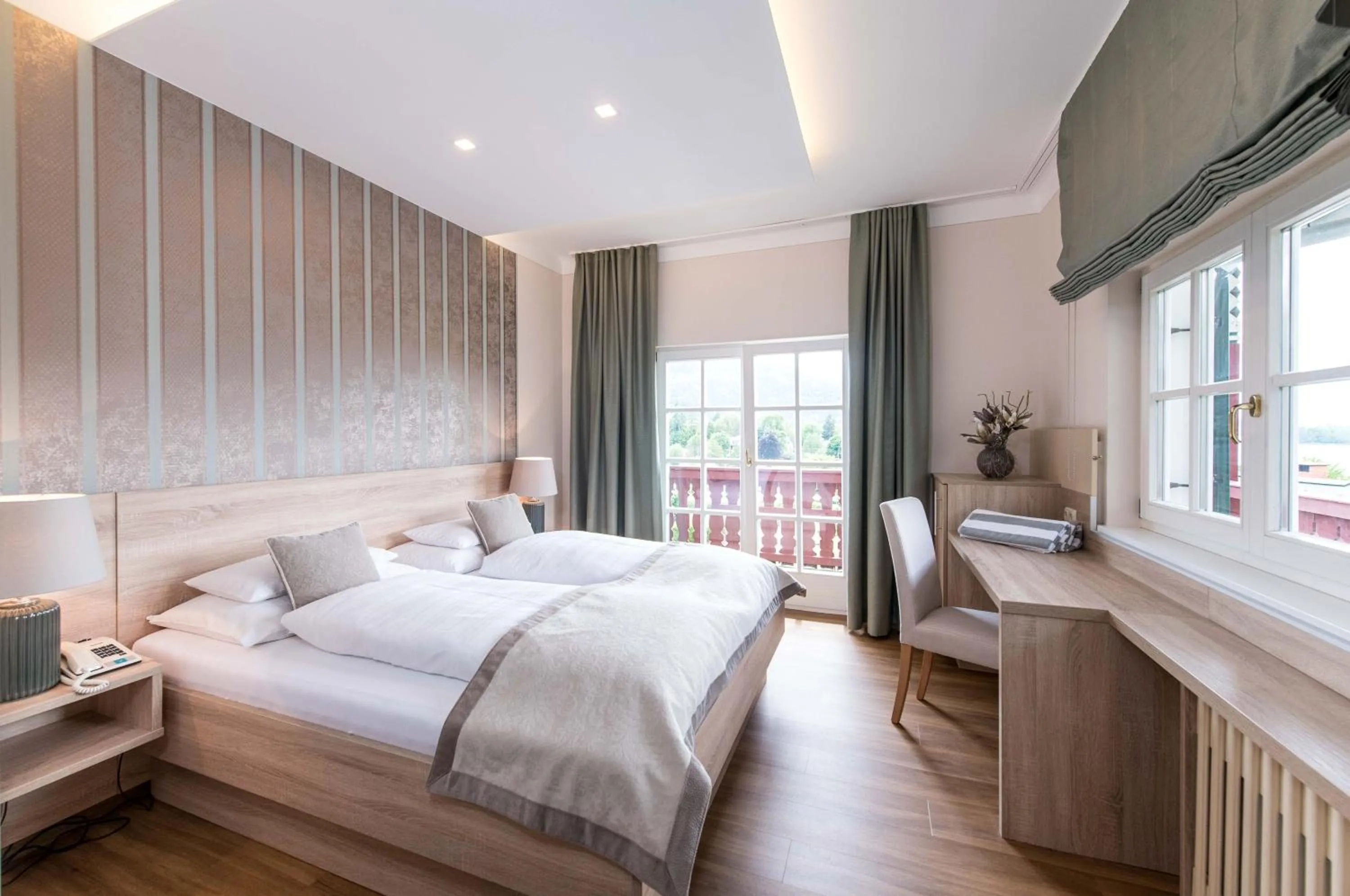 Photo of the whole room, Bed in Lust und Laune Hotel am Wörthersee